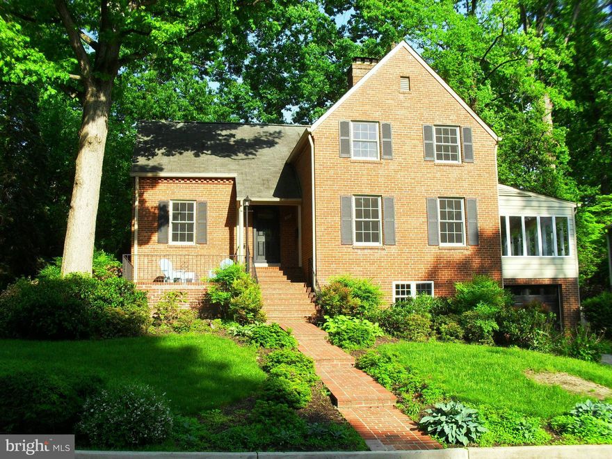 PRICE REDUCED  Walk to Westover Village 1940s colonial brimming w/character.   Nearly 12,000 sq ft lot w/large deck & front porch on tree lined street. Recent HVAC, renovated hall bath; fresh paint, LL carpeting.  Main level BR& bath; LR & DR open to sunny family room w/radiant heat;  fpls LR & rec room; LL den, bath, laundry/storage., deep garage. McKinley Swanson, W-L.