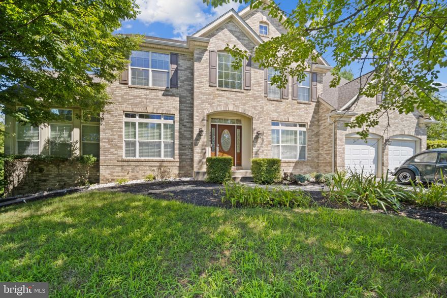 Design, Lifestyle and Location all converge at this special Offering. Graciously located in Bowie, this exceptional 4 bedroom 5.5 bathrooms, 5700+ sq. ft. stunning Contemporary/Modern residence has been meticulously and completely transformed into a spectacular showcase featuring premium fixtures and finishes throughout its highly functional and desirable open floor plan. No detail was overlooked in the spectacular renovation of this home, which exudes modern elegance and warmth. Inside, experience the interior’s flowing spaces and how they are bathed in natural light throughout with soaring 10+ & 2-story ceilings.   As you step into the impressive 2-story foyer, a dramatic staircase complemented with a grand chandelier, introduces you to the home's main level. The main level offers hardwood floors throughout this level with an open and airy living room, a spectacular sunroom, a private office, formal dining room with a kitchen flowing seamlessly into the family room with a cozy fireplace, a wall of full natural light, and access to the large rear deck and large patios for large scale entertaining or cozy days at home.  The kitchen, a poster child for modernity, pairs high end appliances, sleek high-gloss lacquer cabinetry, large center island offers versatile breakfast bar seating, ideal for casual dining or entertaining and expansive countertops present a sophisticated canvas for entertaining and gourmet cooking. 
 This harmonious blend of space and light continues upstairs where a curved staircase majestically twirls itself up the second level. Here, the spacious primary suite awaits, featuring a walk-in closet, a sitting area with cozy 2-sided gas fireplace –perfect for enjoying morning coffee or unwinding with an evening glass of wine. The spa-like marble floored bathroom offers dual vanities, an oversized frameless glass shower with dual showerheads and a large separate jetted soaking tub.  This floor also includes an additional bedroom en suite bathroom and large closet. 2 Additional Generous sized bedrooms grace this floor as well with a Jack and Jill bathroom.   Let’s journey to the lower level where an invitation for the most entertaining atmosphere begins featuring an open multi-function entertainment center of the home.  The fun starts in the bar area featuring an enclosed wine storage area, 2 corner lighted fireplaces, a sitting lounge area, a movie viewing/media projection room, an exercise room and 2 full bathrooms. There are Numerous Large TVs so you'll never miss a play!  Once the game or movie is over, guests may walk-out to the backyard oasis with custom patios and hardscape encapsulating Nature, Peace, and Serenity. Perfect for Large scale entertaining or backyard grilling with family and friends. 
This spectacular residence is luxury living in Bowie at its finest, boasting modern amenities and convenient proximity to neighborhood favorite restaurants, shops, parks, golf courses, and easy access to airports, major highways, and metro for commuting to DC, Northern VA, Annapolis, Baltimore.