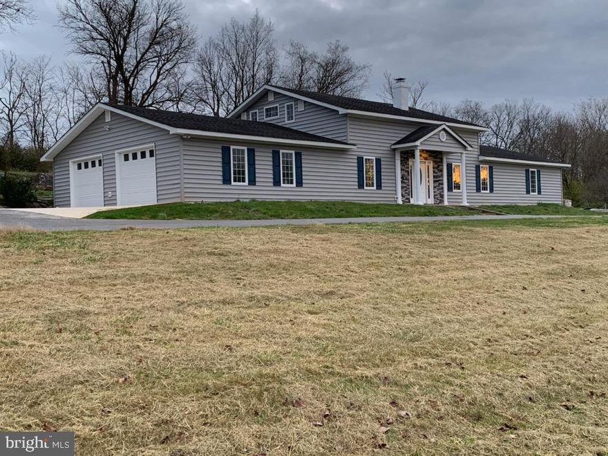 Completely remodeled and ready to be occupied.  This home offers 4 beds, 3 baths on just under 5 acres. Main level owners' suite,  luxurious master bath with soaking tub & separate walk in shower.  Large walk in closet, attached sun room. Family room with fireplace.  Large kitchen area with island, granite counters, recessed lighting.  New stainless steel appliances, heat pump, hot water heater, High -Efficiency.  Separate dining room & laundry room. New casement windows throughout the home.  2 car garage with paved parking area.   Barn/Shed with electric.  MOVE IN READY!  NO HOA!