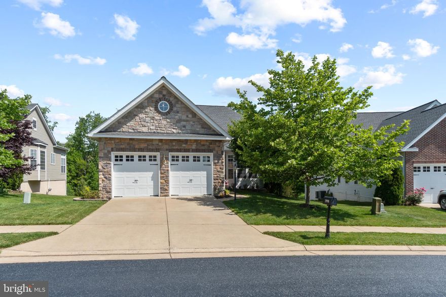 The ultimate lifestyle awaits you in the desirable 55+ active adult gated community at Four Seasons! This elegant home will WOW the pickiest of buyers with upgrades galore, curved archways, gleaming hardwood floors, crown/chair moldings, and an exceptional floor plan with plenty of room to fit all your needs! The main level features a gourmet kitchen with sunny breakfast room with bay window, granite counters, stainless appliances, double wall ovens, gas cooktop, and 42-inch cabinets with roll out drawers. The kitchen is open to a spacious dining room and family room with gas stone fireplace and windows galore! Step outside to enjoy your morning coffee on the back deck overlooking wooded views with privacy. The gorgeous Owner’s Suite boasts TWO WALK-IN CLOSETS and adjoining luxury bath with ceramic tile, jetted soaking tub, separate shower, and dual vanities. You will find an additional bedroom (or office), full ceramic tile bath and laundry room with deep sink on the main level. The front-loading washer and dryer conveys. Mosey upstairs to find the loft with new carpet. This space is great for guest quarters featuring a living room, bedroom, full bath, and bonus room for storage, crafts, or whatever you like! On the lower level you will discover more amazing space to spread-out and entertain. A large recreational room with wet bar and minifridge, spacious bedroom, full bath, media room, craft room, and storage room complete this level. Walk-out to a private patio and relax with your favorite beverage. The pride of home ownership shows thru-out this well-maintained home. NEW ROOF 2020. Basement HVAC 2015, upper-level HVAC 2013, hot water heater 2016. Living in Four Seasons, you get to enjoy the magnificent 21,500 sqft. clubhouse, indoor and outdoor pools, ballroom, fitness center, billiards, game rooms, cyber café, classrooms, bocce ball, tennis, putting green, and walking trail. Great location! Close to I-95, tons of shopping and restaurants. This home is a perfect 10!