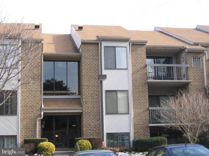 Mays Chapel GREAT VALUE! Third Floor Condo features a lovely Kitchen w/smooth-top stove, expanded cabinetry & counter space, all appliances, & Breakfast Bar dividing Kit & Dining Rm. Convenient built-in shelves in Second Bdrm. Six-paneled doors throughout. Interior just Freshly Painted, new window blinds installed, new neutral toned w/w carpet! A MUST TO SEE!