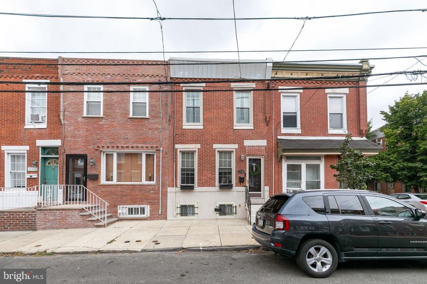 Welcome to 208 McKean St! A charming 3 bedroom 1.5 bath home located on a nice block in the Pennsport section of Philadelphia. This beautifully maintained home offers a perfect blend of modern comfort and classic appeal. The open-concept main floor floods with natural light, showcasing the hardwood floors,  decorative fireplace, custom moldings, exposed brick accent wall, recessed lighting, and stylish finishes throughout. The updated kitchen boasts granite countertops, stainless steel appliances, ample cabinet space, and access to a nice-sized, brick paved rear patio providing a private escape for outdoor gatherings and relaxation. A convenient half bath completes the main level. The second level offers an updated full hall bath, a large linen closet, and 3 ample sized bedrooms, including a large master bedroom featuring an amazing coffered ceiling and a ceiling fan. The finished basement boasts high ceilings and offers additional living space with a separate storage and laundry room. Conveniently located near local shops, restaurants, and parks, this home presents an ideal opportunity for a comfortable and vibrant lifestyle in the city. Don't miss the chance to make this charming residence your own!
