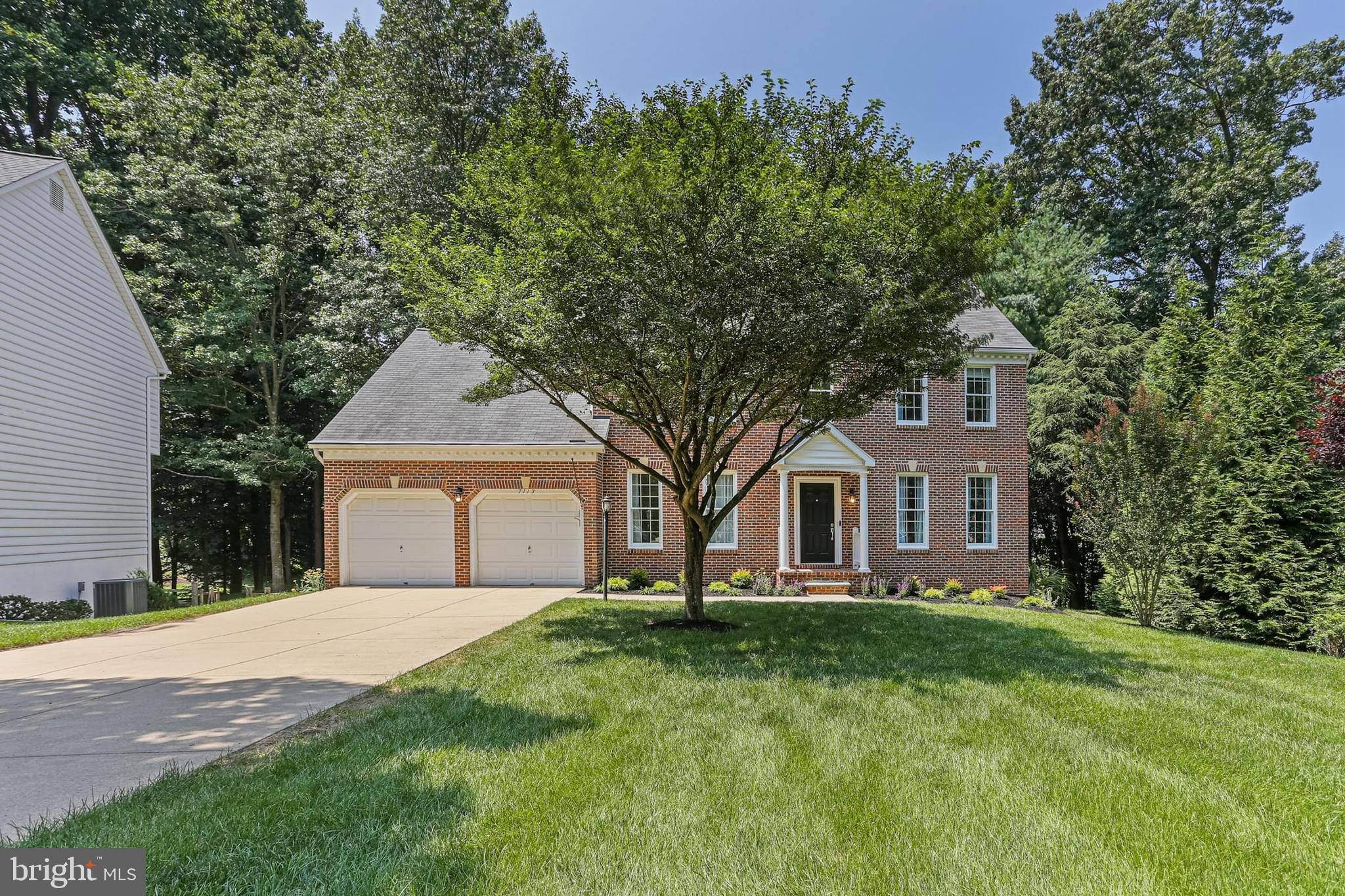 Exquisite River Hill gem backing to serene forest preserve. Nestled on a picturesque 0.42-acre cul-de-sac lot in the coveted River Hill community, this spectacular custom-built residence boasts a total renovation completed since 2020. Immerse yourself in thoughtful design and top-notch craftsmanship throughout this better-than-new home.
The gourmet kitchen is a chef's dream, showcasing expansive bay windows that overlook the tranquil woods, and beautiful tray ceilings. Designer cabinets on all three walls, plus easy-to-clean quartz countertops and backsplash. Top-of-the-line appliances include a built-in integrated refrigerator and dishwasher, an imported Italian gas range with a powerful vented hood fan, and an expansive center island with a built-in microwave. Custom Rejuvenation cabinet hardware adds a luxurious touch. The breakfast nook offers upgraded glass doors leading to a huge deck, creating an idyllic setting for outdoor living.
Enjoy abundant natural light streaming through an abundance of Anderson windows throughout the house. The spacious living and dining rooms flow seamlessly, and a private home office is adorned with built-in bookcases and double windows overlooking the front flowering gardens. Soaring 9'+ ceilings grace the main level, complemented by cathedral ceilings and dual skylights in the family room, which also features extra-wide windows. Hardwood floors extend throughout the entire main and upper levels with flush-mount floor registers, while herringbone pattern floors add character to the foyer and family room. An elegant carpet runner graces the hardwood stairway.
The amazing primary bedroom suite provides a luxurious retreat with two walk-in closets and a bathroom overlooking lush trees and open space. The primary bath includes an oversized shower, free standing soaking tub, and a dual sink vanity with a quartz countertop, and designer tiles. Updates also include new Carrier energy-efficient dual-source HVAC (2024), fresh paint, modern lighting fixtures, and window treatments throughout. The unfinished walkout basement awaits your imagination, offering endless possibilities. Easy parking with a long driveway and large front circle. Prime location—Just a few steps to trails, tot lots, playgrounds, and minutes from River Hill schools, shops, restaurants, CA amenities, indoor and outdoor swimming pools, and commuter routes (108/32/29/95).