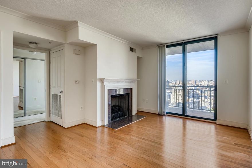 High floor one-bedroom unit available immediately in full-service secure elevator high-rise building with attached garage parking.   24-hour desk, on-site management, rooftop pool, fitness center, internet business center and party room at no additional cost.  Gorgeous unit with wood floors and gas fireplace upgrades.  All utilities, except electric, included!  Just two blocks from inner harbor waterfront and attractions.  Superb location!