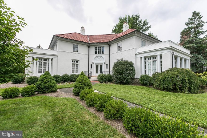 Elegant Guilford Estate. Expansive 4 bedroom, 3.5 bath with spacious light filled rooms, 2 car garage, 2 sunrooms, original stained glass over grand staircase, original hardwood floors throughout, 2 staircases, 1st and 2nd level offices/den.  Private master suite with access to outside. Quality craftsmanship throughout.  This home oozes charm and character.