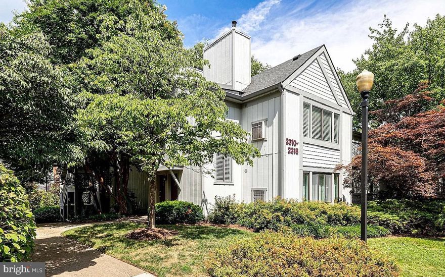 Location, Location, Location!  If that wasn't enough to perk your interest, come inside  and check out this gorgeous move in ready, 2 level, 2 bedroom, 2 bath condo!   It's HUGE, boasting 1,392 sq ft of living  space and offers tons of natural light .  The fully renovated kitchen, remodeled bathrooms, wide plank hardwood floors and neutral color palette are only some of the fine features that make this home so desirable. The gourmet kitchen will be sure to please with its gleaming  Quartz countertops, Custom white cabinetry and stainless steel appliances. The formal dining room opens nicely into the family room, perfect for entertaining. Relax with the cozy wood burning fireplace and enjoy all the light that streams in from the wall of windows in the adjacent sunroom which is perfect for a home office. The separate laundry room offers full-size machines and extra storage space. The primary bedroom suite is generous in size and features a walk-in closet. The attached bathroom has been fully remodeled with a new vanity, lighting, ceramic tile flooring  and a walk in shower.  An additional bright and spacious bedroom is served by another upgraded stylish bathroom with a shower/tub combo. This home has so many designer touches.  It's a must see to believe... and BRAND NEW WINDOWS to boot!! All this can be found in a peaceful community with fabulous Reston amenities -outdoor pools, tennis courts and more! Perfectly situated for easy commuting to route 267, a few miles to the metro stop, and a short drive to Reston Town Center. Walkable to Hunters Wood Shopping Center.