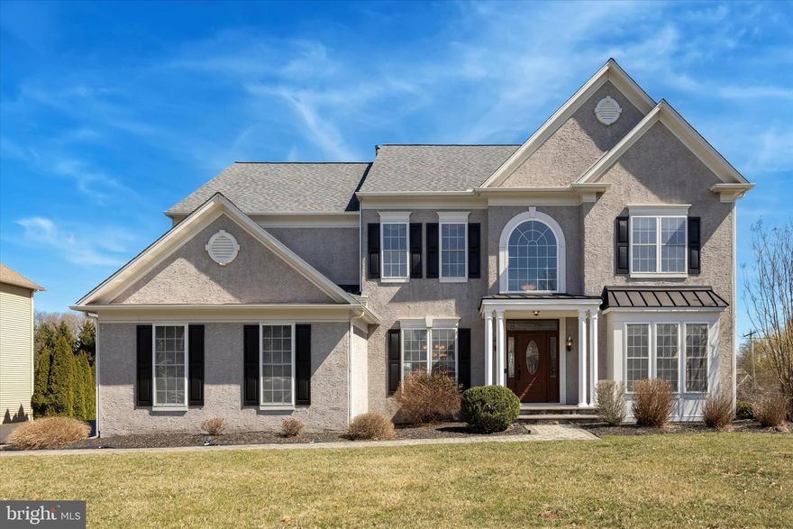 Welcome to 128 Applegate Drive. Nestled in the highly desirable Applegate community of West Chester, this meticulously maintained home offers the perfect location for those seeking proximity to downtown West Chester while enjoying the comfort of a well-established neighborhood. As you step inside, you are welcomed by vaulted ceilings, gleaming hardwood floors, and elegant moldings. The dining room, adorned with chair rail, crown molding, and large windows, provides ample space for both everyday meals and special occasions. The living room, featuring hardwood flooring and classic moldings, offers versatility and could serve as a den or sitting room, seamlessly flowing into the rest of the home. Continuing through, you'll find a powder room, a spacious coat closet, and a dedicated home office. The office boasts decorative moldings, large windows, hardwood flooring, and glass French doors—creating a bright and productive workspace. At the heart of the home is the expansive family room, showcasing soaring vaulted ceilings, a gas fireplace, and two stories of windows that flood the space with natural light. Open to both the breakfast area and gourmet kitchen, this space perfectly balances traditional charm with an open-concept layout. The kitchen is a chef’s dream, featuring a large island, abundant cabinetry and countertop space, a walk-in pantry, and access to the back deck. Just off the kitchen, you’ll find a laundry room, an additional coat closet, and entry to the oversized two-car attached garage. The second floor hosts a spacious primary suite with a luxurious en-suite bathroom, complete with a double vanity, glass shower, soaking tub, and walk-in closet. The second bedroom features its own en-suite bath with a shower/tub, while two additional bedrooms—one with a walk-in closet—share a Jack & Jill bathroom with a shower/tub combination. The finished lower level is an entertainer’s dream, offering a gas fireplace, a large wet bar, and a full bathroom with a shower/tub. This versatile space is perfect for a home theater, gym, recreation room, or whatever suits your lifestyle. Large windows and a sliding glass door lead to the back patio, enhancing the space with natural light and seamless indoor-outdoor flow. With recent updates including a new HVAC system (2024) and hot water heater (2022), this home is truly move-in ready. If you’re looking for a beautifully maintained home in an established community just 10 minutes from downtown West Chester, look no further!