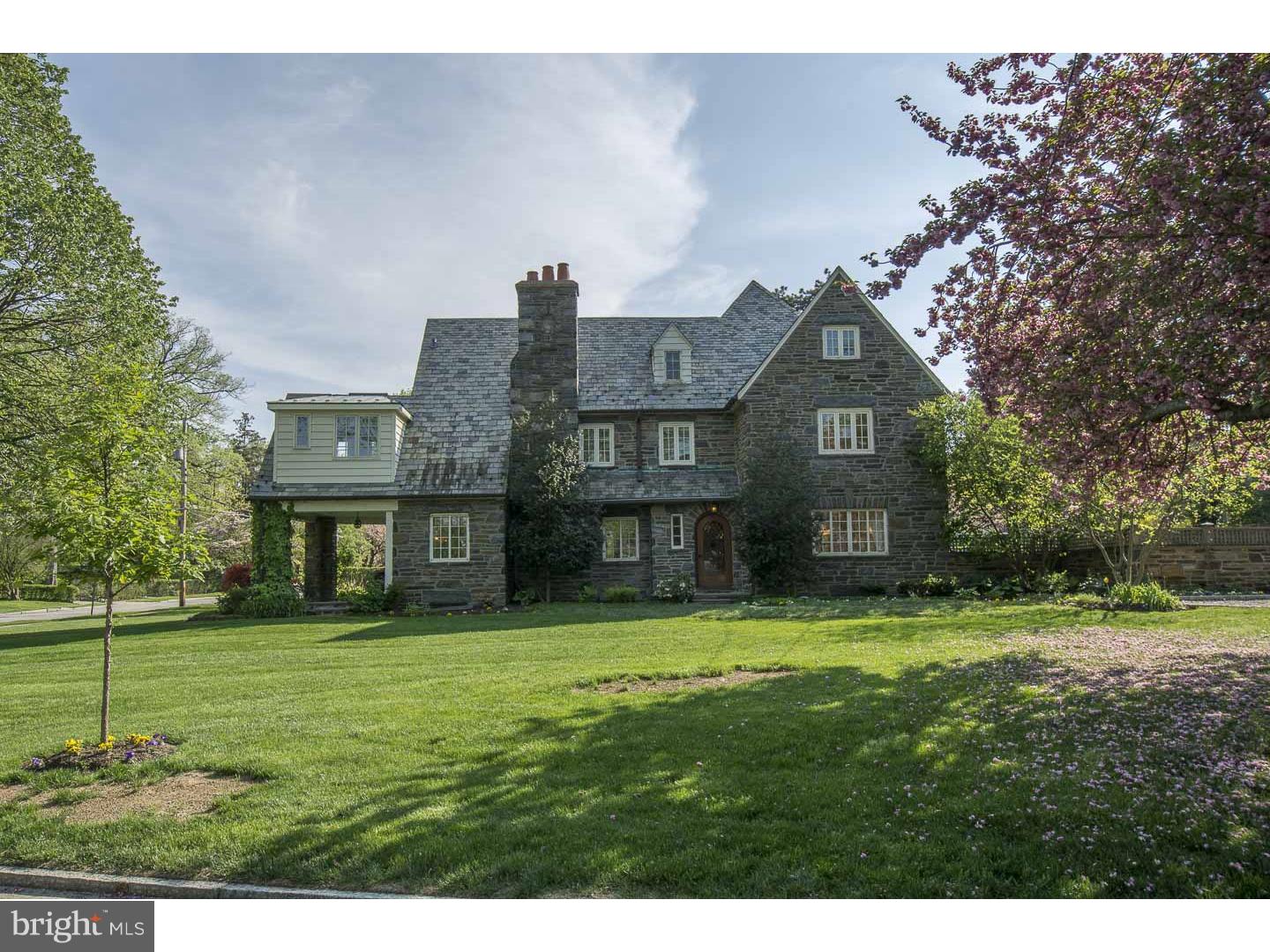 THIS STONE MANOR HOUSE BOOST CHARACTER......Starting with a Beautiful Stone Exterior, Slate Roof and Slate walkway. You are then drawn to the Side Covered Porch. Next, take in the tasteful Pebbled/Belgium Blocked Driveway and Spacious Garage. The Beautiful woodwork throughout the home is consistent with the period and architecture and lends itself to the integrity of the house. The Newer kitchen is fully equipped with stainless steel appliances and granite. There is a sun filled Breakfast/morning room that will please any buyer. The Large Center Hall offers great flow throughout the first floor. The 2nd floor has 4 large bedrooms and 3 baths. This wonderful house is absolutely move-in condition making this a home you will want to own. A major bonus is walking distance to the Bryn Mawr train station, Schools as well as the Movie Theatre, shops and Restaurants.