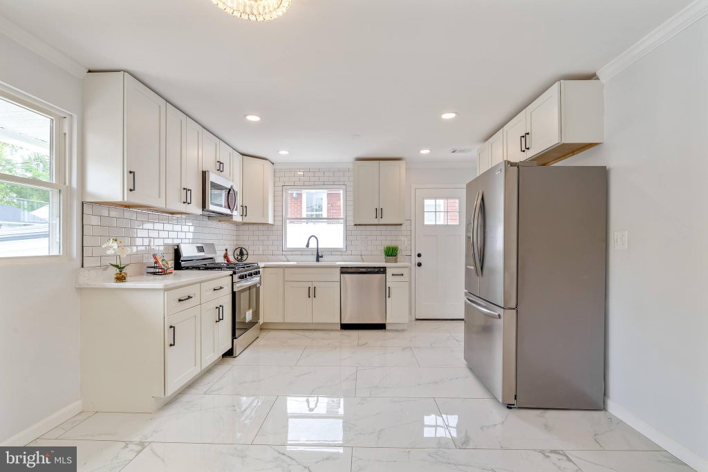 Photo of 7850 Burnside Road, LANDOVER, MD 20785 (MLS # MDPG2201758)