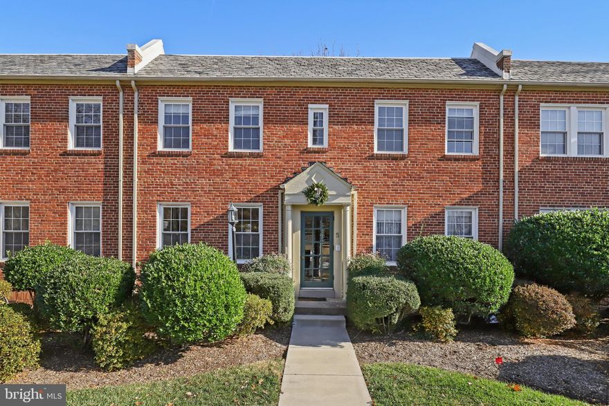 RARE opportunity to live directly across from King Street Metro, VRE, and Amtrak in Old Town Alexandria!  Charming and Spacious 1BR/1BA condo has a private entrance behind the building.  Enjoy peace and quiet as you unwind on your large back porch.  You won't need a car to live here, between metro, Amtrak, the Old Town Trolley and walkability to restaurants and stores.  But, if you have a car, park it in your designated parking spot, #5.  There is a private driveway on the right side of the building - directly off King Street near the light to Russell Road.  There is also guest space along the fence.  Live at the base of Alexandria's most iconic landmark - the Masonic Temple - simply stunning architecture!  Gorgeous refinished hardwood floors beacon you.  Custom plantation shutters offer full light by day and privacy by night.  Bright kitchen with gas cooking with Kenmore suite of appliances.  The bathroom boasts honeycomb patterned tile floor, a new pedestal sink and toilet and subway tiled shower and tub with updated fixtures.  Note the original brass door knobs with keyholes - so cute!  Freshly painted!  Hot water heater was replaced last year!  Cyclists can access the bike path along GW Parkway to Mount Vernon, Washington, DC and beyond.  So close to Whole Foods, the Waterfront and an array of restaurants and shops to explore, along with Old Town's rich history!  YOU WILL LOVE LIVING HERE!