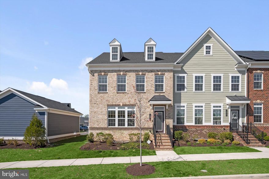 Shows like a model home—this rarely available end-of-row townhome is one of the largest models in Greenleigh and no longer being built. Constructed in 2021, this beautifully maintained home offers over 3,700 square feet of finished living space with 4 bedrooms and 3.5 baths, combining modern design with everyday functionality.

The main level features an open-concept layout with LVP flooring, seamlessly connecting the living, dining, and kitchen areas. The gourmet kitchen is designed for both style and function, offering stainless steel appliances, abundant cabinetry, a spacious layout, and a large pantry. Step outside to the 10x24 composite deck—perfect for relaxing or entertaining.

Upstairs, you’ll find generously sized bedrooms with plush carpet and upgraded padding. The primary suite is a true retreat, featuring two walk-in closets, a double vanity, and an oversized spa-like shower. Two additional bedrooms and a full bath complete the upper level.

The finished lower level offers incredible flexibility with a large media/family room and a fourth bedroom ideal for guests, a home office, or gym. Additional highlights include wood stairs, Hardie siding, a tankless water heater, and a built-in air treatment system.

Enjoy low-maintenance living with an HOA that covers landscaping and snow removal. A detached two-car garage provides ample parking and storage. Located in a vibrant community with amenities including a pool, clubhouse, walking trails, playgrounds, and more—just a short walk to Michael’s Cafe and minutes to White Marsh Mall and The Avenue—plus easy access to I-95 and I-695.