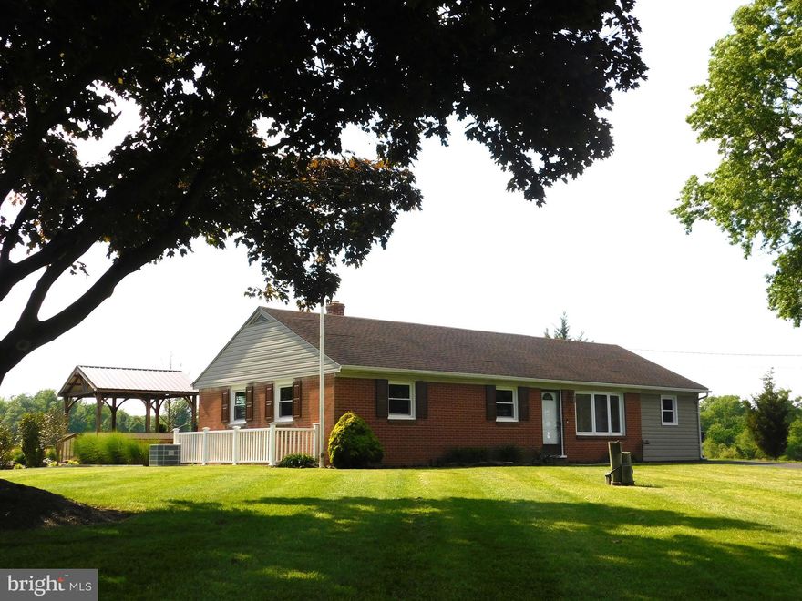 Brick rancher nestled among AG Preserved Farm Land.  Updates include Oil Fired Heat & CAC (2024), Pella replacements windows and doors (2024),  well pump and tank (2020), 30-year composition shingle roof (2014), and low dose pressure septic system (2011).  Hardwood floors, granite kitchen counters, stainless steel appliances.  Rear concrete patio with pavilion, brick fireplace with Rutherford style masonry brick entry pillars, and fish pond with fountain.  Detached Garage/Shop with Atlas 8-ton 2-post lift,  Fisher wood stove, shelving, and separate storage area.  See MLS documents for detailed brochure, maps, Health Dept. records, and Seller disclosures.  Professional photos coming soon....