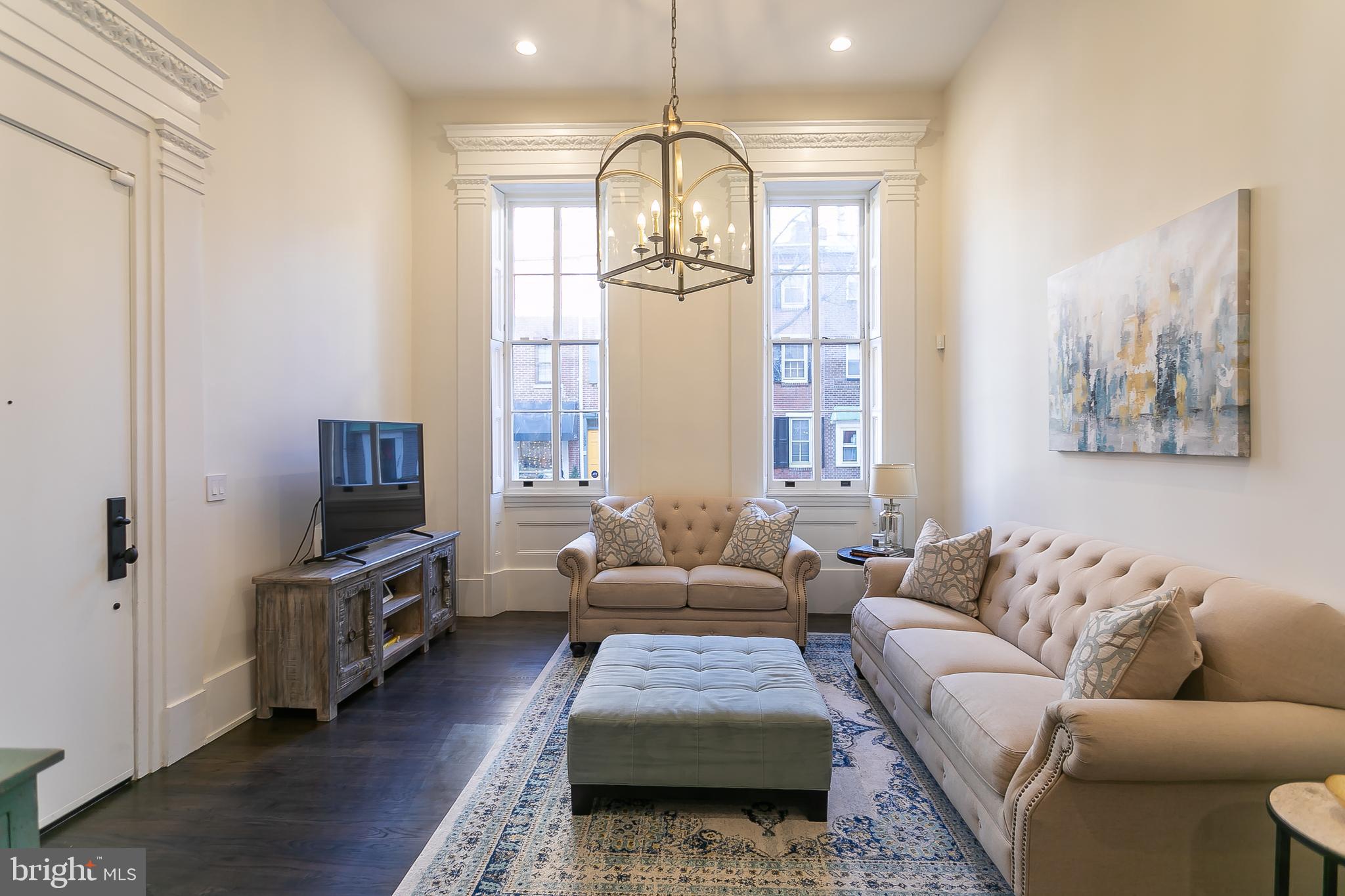 Welcome to an exquisite residence, with a parking space, nestled in the heart of Philadelphia at 1508 Pine Street, Unit A! Offered by a motivated seller, this elegant brownstone offers an impressive 1,773 square feet of contemporary living space spread across four meticulously designed levels. There is an additional 400 square feet of livable space in the recently refurbished basement. With two spacious bedrooms and two and a half luxurious bathrooms, this home epitomizes refined urban living.
Step inside to discover high ceilings and hardwood floors that guide you through a sophisticated layout, featuring a formal dining room perfect for entertaining. The living area boasts a charming fireplace, creating a warm and inviting atmosphere. The gourmet kitchen is equipped with top-of-the-line appliances, including a Viking range, refrigerator, dishwasher, and microwave, complemented by a sleek powder room.
Enjoy the convenience of in-unit laundry with a washer and dryer, and relish the added security included. A dedicated parking spot ensures convenience and ease of access!