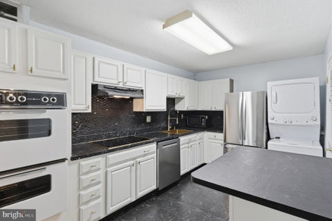 Photo of 8340 Greensboro Drive #106, MCLEAN, VA 22102 (MLS # VAFX2328738)