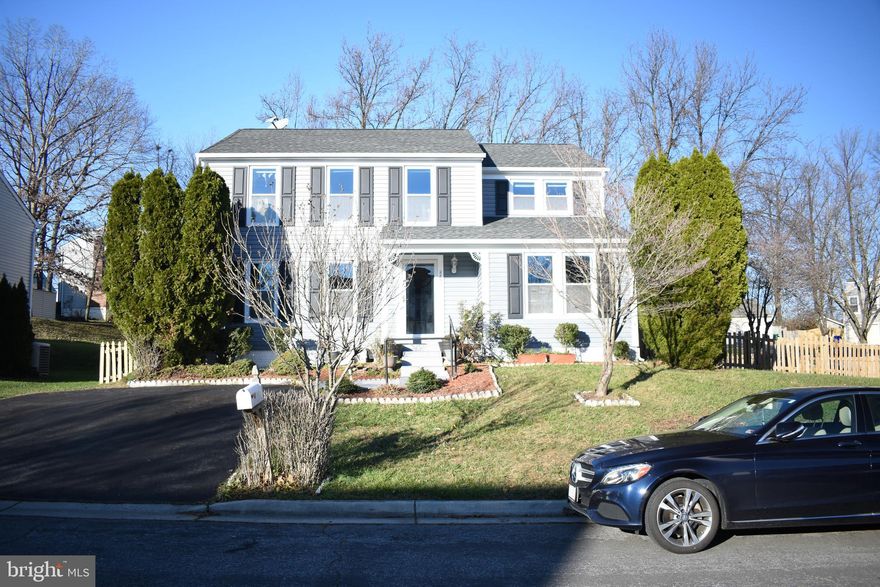 SHOWINGS ONLY ON WEEKEND.  ALL OFFERS WILL BE REVIEWED ON MONDAY EVENING. Welcome home to this beautiful and spacious colonial on a corner lot. Hardwood floors throughout, formal living and dining, updated eat-in-kitchen with new stainless steel appliances installed in 2019.  Beautifully updated bathrooms with tile flooring and shower walls.  Finished basement offers a large family room, laundry and plenty of storage space. A fenced-in yard with large deck with built-in seating completes this home. Several recent upgrades including  roof and all new siding and gutters completed in 2012, AC unit replaced in 2018, water heater replaced in 2018 , energy efficient windows  and french doors completed 2015.