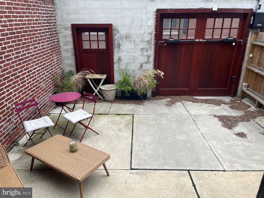 PRIVATE PARKING AND OUTDOOR SPACE!! Welcome home to 734 Pine Street, a beautifully rehabbed classic Philadelphia Historic Mansion. This unit is one of the six 21st Century luxury residences with historic charm. Your new home welcomes you with wide hallways, high ceilings and chandeliers. Available June 15th, unit 1R is the first floor rear unit with 1 bed/1bath, newer hard wood floors, working gas fireplace, original marble mantel beautifully restored, chef's kitchen with granite counters, breakfast bar, stainless steel appliances, 5 burner gas cooking, dishwasher, garbage disposal, built-in microwave, lots of cabinets, central air, gas heat, separate gas hot water heater. New bathroom with shower, ceramic tile surround & floor. Laundry in unit. New Energy Efficient Double Pane Historically Designed Windows. This unit provides a PRIVATE OUTDOOR PATIO in the back facing south towards Addison Street. Parking INCLUDED (please note the space isnt huge so a sedan or small crossover would fit best). Landlord provides cold water. Tenant pays electric and gas. Cat friendly only with no pet fees. Requires first month rent, last month rent & 1 month security deposit due up front at lease signing. Close to Pennsylvania, Wills Eye and Jefferson Hospitals, public transportation, I95, 76, shopping, restaurants and all that the city has to offer.