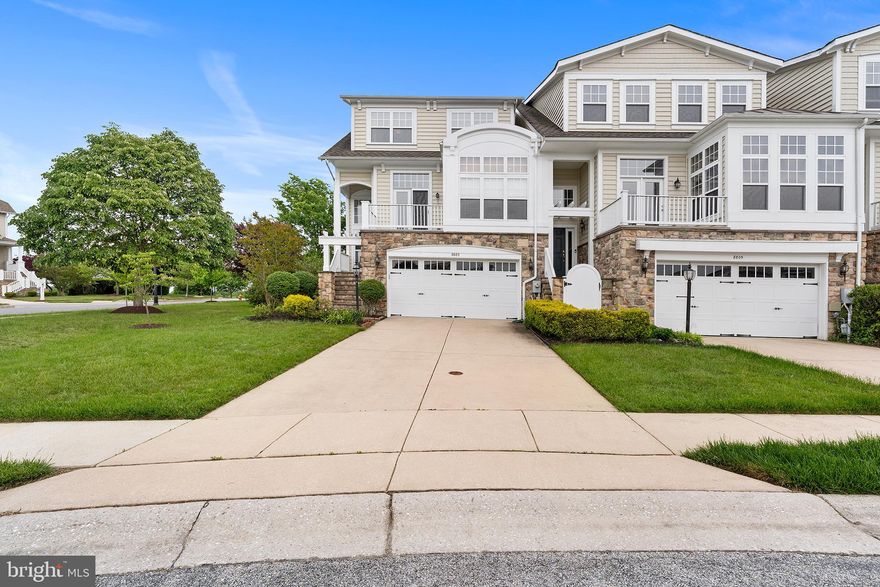 Welcome to this expansive 4-bedroom townhome offering over 3,400 square feet of beautifully designed living space in a wonderful gated community with exceptional amenities and lake access. The impressive main level features soaring 10-foot ceilings, creating a bright and open atmosphere throughout. The beautiful eat-in kitchen is designed for both everyday living and entertaining, featuring granite countertops, a large center island, and stainless steel appliances including a gas cooktop and microwave range hood. Just off the kitchen, the inviting family room is highlighted by a cozy gas fireplace and a door leading to the deck overlooking peaceful natural views.


The main level also offers a formal dining room and a dedicated home office, providing flexibility for entertaining and remote work. Upstairs, you'll find a convenient laundry nook, a full bathroom with double sink vanity, and three spacious bedrooms including an impressive owner's suite with a tray ceiling, large closet, private ensuite bathroom with double sink vanity, soaking tub, and separate shower. A door from the owner's suite provides access to a private upper-level deck.


The finished lower level adds even more living space with a second family room, fourth bedroom, full bathroom, garage access, and a door leading to the patio—perfect for guests, recreation, or multi-generational living.


Additional highlights include a 2-car garage and access to outstanding community amenities including a pavilion with fireplace available to rent, tennis courts, putting green, scenic walkways surrounding the 25-acre lake, the ability to dock a small boat or canoe, and the security and convenience of a 24-hour guard-attended gate. Ideally located just off I-95, this home offers both tranquility and excellent commuter access.