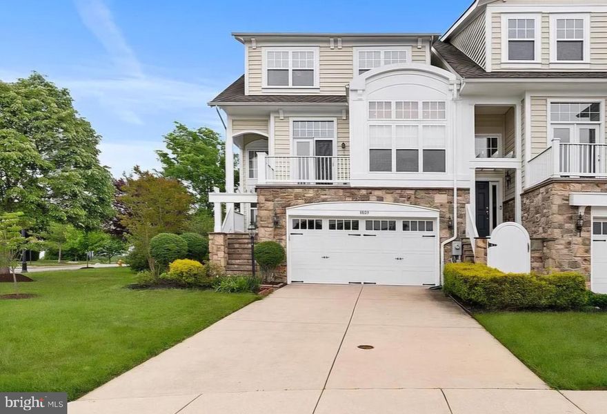 Welcome to this expansive 4-bedroom townhome offering over 3,400 square feet of beautifully designed living space in a wonderful gated community with exceptional amenities and lake access. The impressive main level features soaring 10-foot ceilings, creating a bright and open atmosphere throughout. The beautiful eat-in kitchen is designed for both everyday living and entertaining, featuring granite countertops, a large center island, and stainless steel appliances including a gas cooktop and microwave range hood. Just off the kitchen, the inviting family room is highlighted by a cozy gas fireplace and a door leading to the deck overlooking peaceful natural views.


The main level also offers a formal dining room and a dedicated home office, providing flexibility for entertaining and remote work. Upstairs, you'll find a convenient laundry nook, a full bathroom with double sink vanity, and three spacious bedrooms including an impressive owner's suite with a tray ceiling, large closet, private ensuite bathroom with double sink vanity, soaking tub, and separate shower. A door from the owner's suite provides access to a private upper-level deck.


The finished lower level adds even more living space with a second family room, fourth bedroom, full bathroom, garage access, and a door leading to the patio—perfect for guests, recreation, or multi-generational living.


Additional highlights include a 2-car garage and access to outstanding community amenities including a pavilion with fireplace available to rent, tennis courts, putting green, scenic walkways surrounding the 25-acre lake, the ability to dock a small boat or canoe, and the security and convenience of a 24-hour guard-attended gate. Ideally located just off I-95, this home offers both tranquility and excellent commuter access.