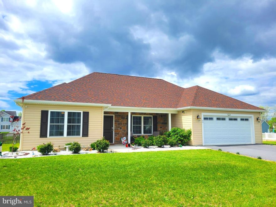 SPRING INTO A NEW HOME BEFORE SUMMER! This beautiful and spacious rancher, only 4 years young, has been meticulously maintained and is ready for you to call it home! Located in the attractive and desirable Bridle Creek community, you'll enjoy the quiet and peaceful setting, while still being close to everything. In addition to being a premium location, close to retail, restaurants, schools, and the MARC train station, Bridle Creek offers walking trails, sport courts, and wide roadways. The home is ideal for any generation or stage of life, as it is true slab construction with no steps to enter the home from the covered front porch or garage. Inside this immaculate home, you'll notice halls and doorways that are very wide for ease of navigation throughout the home, no matter how you transport yourself from room to room. The open floor plan offers a massive great room (kitchen/dining room/living room) at the heart of the home that is wonderful for entertaining. The current owners have improved this space, and the adjacent hallway to bedrooms 2 & 3, with tasteful shadow boxing and chair railing the whole way around. The kitchen offers granite counters and stainless steel appliances. The kitchen also offers a pantry as well, which is noticeably absent in many homes with open floor plans similar to this one. This home also features a split-bedroom design, with the primary suite on one side of the home and bedrooms 2, 3, and the common bathroom on the complete opposite side of the home (separated by the great room). There's no need to settle for a laundry "closet" either, as this home offers a full, dedicated laundry ROOM. Central A/C and propane heat ensure you'll be cool in the summer and nice-and-toasty in the winter. The true 2-car garage offers space for two vehicles and will still leave you room for storage of other necessities. In the rear, the owners have added a concrete patio perfect for morning coffee or evening cookouts. What's not to love? Schedule your appointment to tour this gem today! IF YOU LIKE WHAT YOU SEE, CALL       !!!!!!!