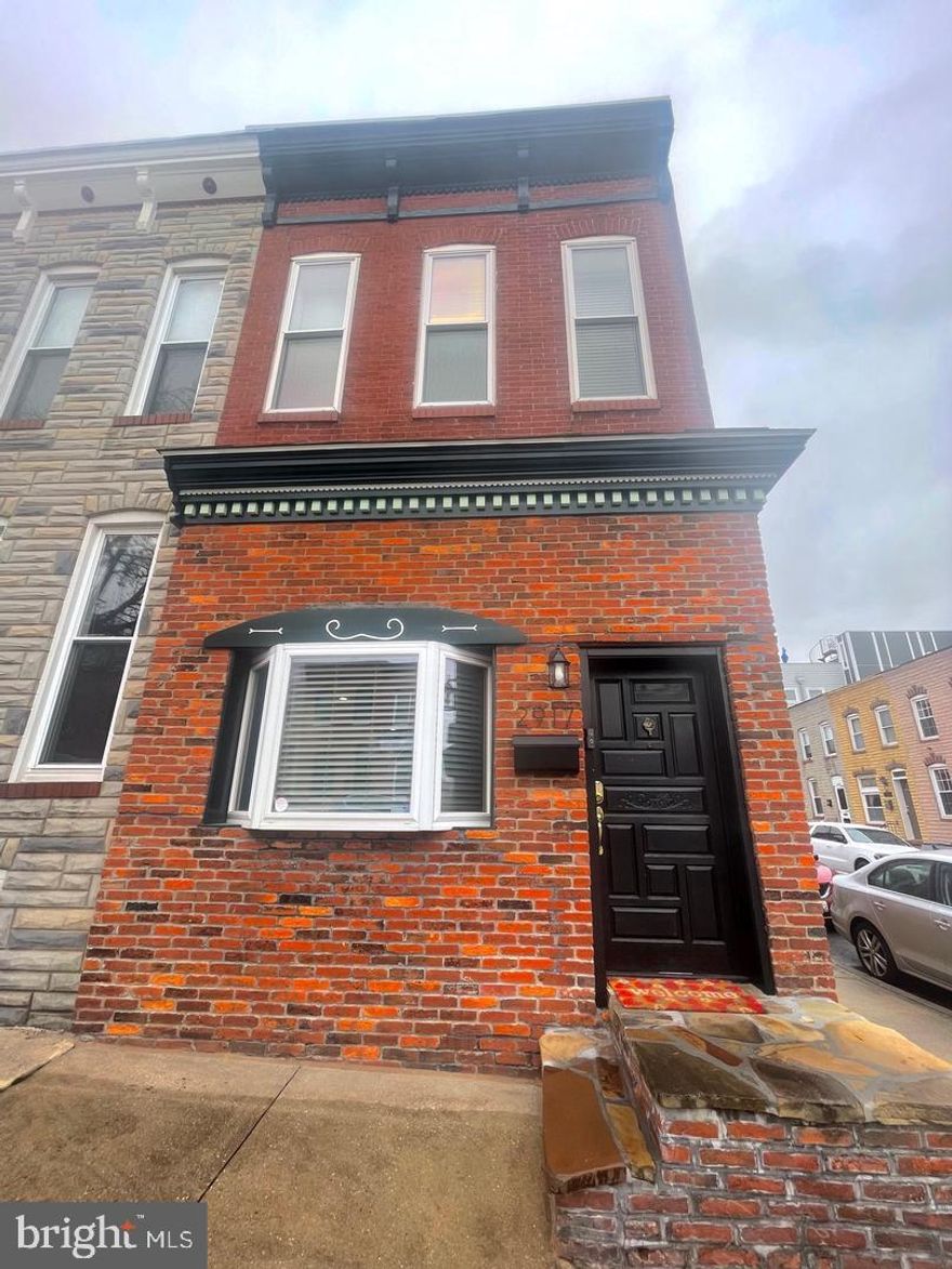 Get ready to call this beautifully maintained corner end of group your home! This canton charmer has been renovated and cared for by the owners. Enjoy more than 1536 square feet, this 14' wide end of group boasts an abundance of natural light and ample space within just steps on the same block to Canton Square. The property also has a rear yard that has a side entrance for parking on Curley Street and back yard entertaining. Featuring 2 large bedrooms, flex space or additional bedroom downstairs, 1.5 baths, a ventless gas fireplace, a spacious kitchen, separate dining area, finished basement, French doors, a trex deck off the upper level rear bedroom and private courtyard all that awaits you, all to include the ADT security system for peace of mind!
