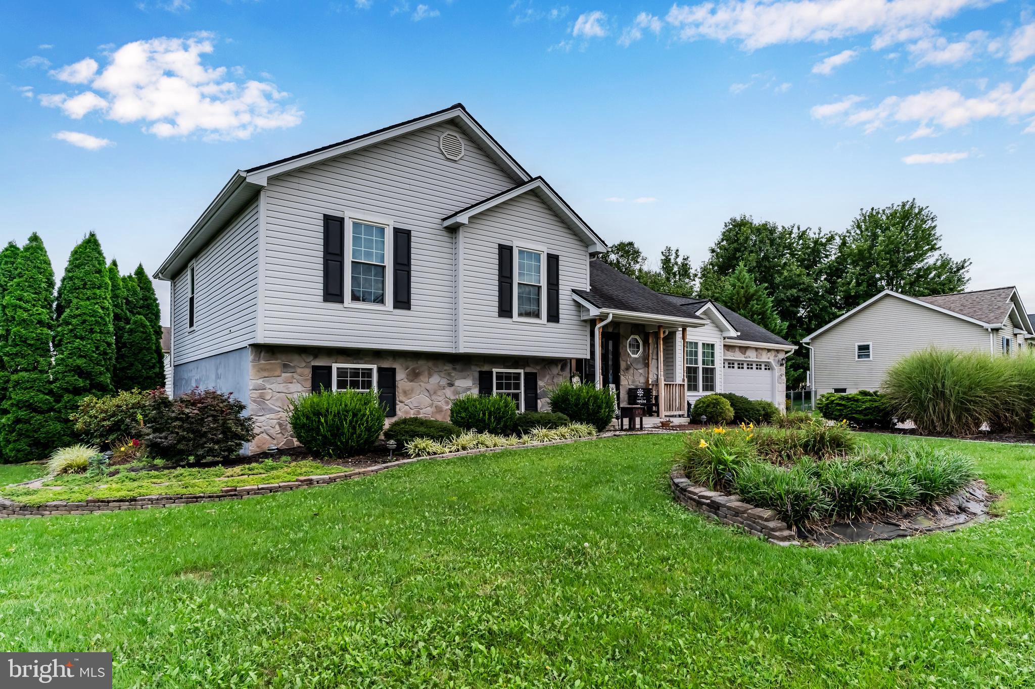 Nestled in the charming Beaver Colony subdivision, this delightful split-level home offers a perfect blend of comfort and functionality. Built in 2000, the property showcases a timeless design with vinyl siding and elegant stone accents, nice covered front porch and a large back deck with a hot tub and a gazebo. This home features three bedrooms , two and a half bathrooms, providing ample space for relaxation and daily living. The inviting layout includes a partial basement, partially finished area is great for a home office or a cozy retreat. The laundry area is conveniently located in the basement, making chores a breeze. Step outside to discover a beautifully maintained 0.29-acre lot, level and ready for your personal touch. Imagine hosting gatherings on the expansive deck or enjoying quiet evenings in the hot tub under the gazebo, surrounded by nature. The attached oversized garage, with a front entry and concrete driveway, ensures plenty of parking and easy access. With its warm ambiance and thoughtful features, it’s ready to welcome you home. Don’t miss the opportunity to make this inviting space your own!