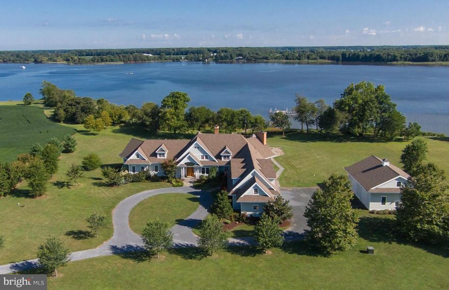 Enjoy coastal living in this classic Nantucket-style estate * Sited on 5 manicured acres on the Corsica * Waterside swimming pool * Private pier with 3 lifts * Granite Chef's Kitchen * Owners Suite with His & Hers tumbled marble baths * All en suite bedrooms inc. huge game rm/apartment * 3-car garage plus detached 2-story garage for boats and/or car enthusiasts * /Court approval obtained!