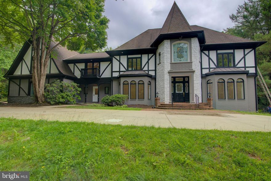 Grand Estate Home on Private 2 Acre Culdesac Lot in Vienna! Oversized 3 car garage. High end finishes throughout including brand new Kitchen & Bathrooms. New White Oak wide plank flooring. Stunning entrance w/ wide foyer & dramatic curved staircase. Soaring 2 story great room w/ fireplace & custom surround. Gourmet kitchen w/ JennAir, huge island, tons of cabinet space; opens to breakfast room w/ skylights & fireplace. Walkout to expansive terrace w/ hot tub overlooking rear grounds & sport court. Luxury primary suite w/ octagonal sitting room, cedar closet, huge walk-in closet; bathroom w/ hi-end fixtures & finishes. Lower level features custom bar area, game room, sunken rec room w/ fireplace, sunroom/fitness area, bedroom suite & 2 full bathrooms. Circular front driveway & side-load 3 car garage w/ bonus yard/sport equipment garage. Very peaceful & private yet only mins to downtown Vienna!