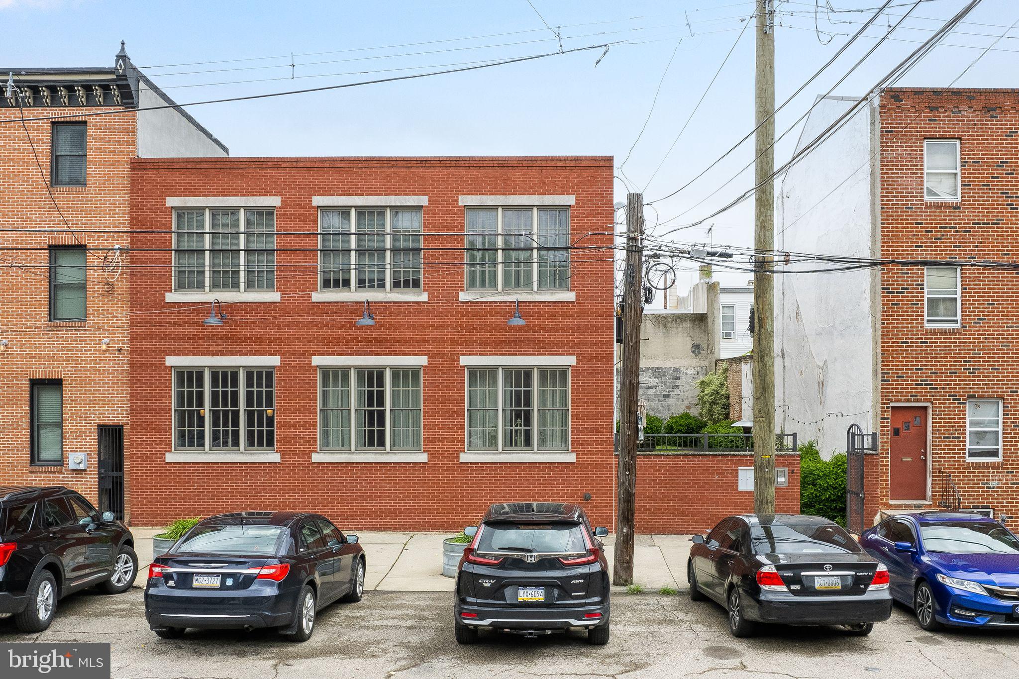 This distinctive multi-family property comprises four townhomes on a single parcel, situated in a charming gated courtyard in the heart of Fishtown. Each townhome offers a blend of modern upgrades and comfortable living spaces, ideal for renters seeking a vibrant community atmosphere.
Unit A is the owner's unit and features a two-story layout with two bedrooms, two full bathrooms, and a half bath on the first floor. It boasts abundant natural light, a beautiful chef's kitchen, a gas fireplace, and high ceilings. This unit is owner-occupied, with a projected rental income of $2800-$3000 per month if leased.
Units B, C, and D are two-story townhomes with two bedrooms and one full bathroom. These units are similarly upgraded, featuring modern kitchens and baths, open spaces, high ceilings, washers and dryers, and a small private patio area.
The property's gated courtyard offers privacy and a sense of community, with each townhome having its private entrance. The location in the lively Fishtown neighborhood provides convenient access to local amenities, dining, entertainment, and public transportation, making it highly desirable for renters.
This unique multi-family property is an excellent investment opportunity with its prime location, modern upgrades, and attractive rental potential. Whether you plan to live in Unit A and rent out the other three units or lease all four, this property promises a blend of comfort, style, and financial return.