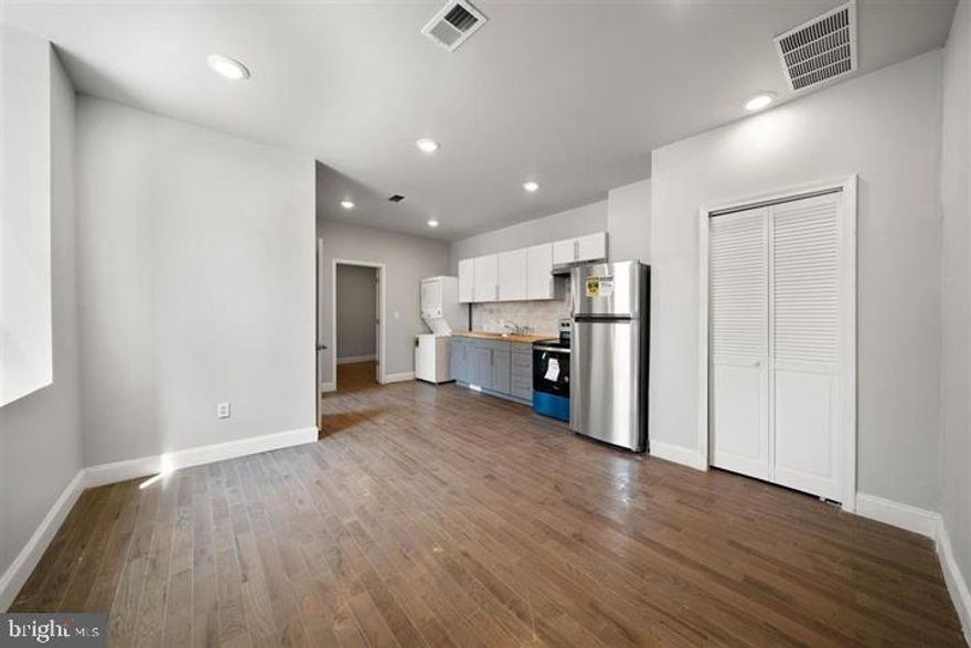 Welcome to this 1 bedroom/1 bath loft apartment. It is waiting to awe any potential tenant! You will be greeted with a cozy small  living space and an open kitchen concept that features high ceilings, recessed lighting, hardwood floors, new kitchen cabinets and appliances, an in-unit washer, and reserved parking! This beauty also features a fully remodeled bathroom with a free-standing vanity with a new mirror and bathroom fixtures. The bedroom is large and has plenty of natural lighting and space to accommodate all of your needs. In addition to the rent, the tenant is responsible for paying water  $50.00 each month everything runs on electricity. This beauty will not last long! Schedule your tour today!  This unit is section 8 approved. credit score must be at minimum 620, income must be 3 times the rent, and must be open to a background check.