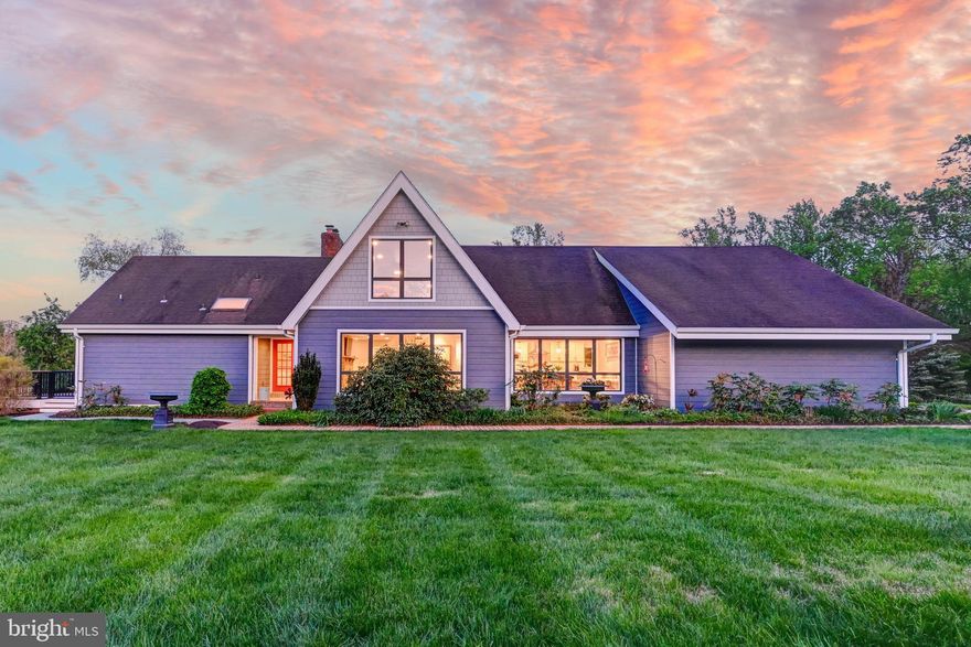 Live authentically. Welcome to your country retreat in the heart of Monkton. Nestled in the sought-after Hereford Zone, set on 9+ peaceful acres. This home feels like a breath of fresh air—quiet, cozy, and full of charm. The updated kitchen offers generous counter space, perfect for morning coffee or prepping dinner with a view. The main level primary suite feels like a gentle escape, with direct access to the wraparound deck—ideal for slow mornings or starry nights. The sunroom is bathed in natural light, and the fenced backyard offers a flat, open space for gathering, relaxing, or letting little ones roam. Out front, sweeping countryside views remind you to slow down and stay awhile. Minutes to Hereford shopping to the north, or Wegmans to the south. Cultivate your existence.  The art of uniting human and home.