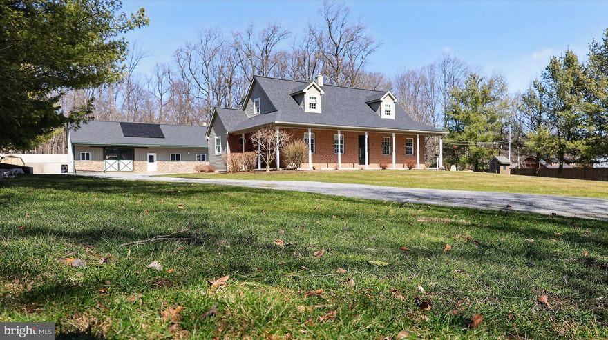 **This property will be offered at Public Auction on May 9, 2026 @ 6:00 PM. The listing price is the suggested opening bid only and in no way reflects the final sales price. $40,000 Deposit due on auction date. 2% transfer tax to be paid by the purchaser. Settlement on or before July 8, 2026.** Set on 1.8 scenic acres in the heart of Welsh Mountain, this well-maintained 3-bedroom, 2-bath homestead offers the perfect blend of comfort, functionality, and self-sufficiency. The home features a bright and inviting layout with hardwood floors, a spacious living and family room, dedicated office, and a thoughtfully designed kitchen with peninsula seating. Enjoy outdoor living on the wrap-around porch, large deck, and beautifully landscaped grounds surrounded by mature trees. Recent upgrades include a new roof (2023) and a state-of-the-art solar system (2025), with the property fully equipped for on- or off-grid living, including extensive in-floor heat, propane utilities, and backup systems. Ideal for hobby farmers or equestrian use, the property includes a 28’ x 52’ two-stall horse barn with workshop, additional outbuildings, pasture area, and ample storage. A rare opportunity to own a turnkey rural retreat with modern efficiency and timeless appeal.