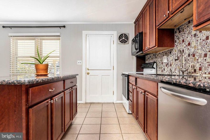 Welcome to this charming three-bedroom, one-and-a-half-bathroom rowhome nestled on a serene street in Conshohocken Borough, within the esteemed Colonial school district. Situated on a tranquil one-way street with ample parking, this home offers a peaceful retreat. Step inside to discover a spacious open-concept living room bathed in natural sunlight, seamlessly flowing into an updated eat-in kitchen. The kitchen boasts granite countertops, a tasteful tile backsplash, newer cabinetry, a kitchen island, and a cozy dining area. Beyond the kitchen, you'll find a generous fenced backyard, complete with a storage shed and covered back porch, perfect for outdoor gatherings.

Original hardwood floors grace the first and second floors, adding warmth and character to the space. The partially finished basement features wall-to-wall carpeting, a convenient half bath, a laundry area, central air, and ample storage space. With walkout stairs leading to the backyard, accessing outdoor amenities is effortless. Enjoy the convenience of this prime location, just a short stroll to Sutcliffe Park and mere minutes from bars, restaurants, and shops. Public transportation options abound, and easy access to interstates 476 and 76 simplifies commuting to the city by car. Don't miss the chance to make this wonderful home yours—schedule your showing today!