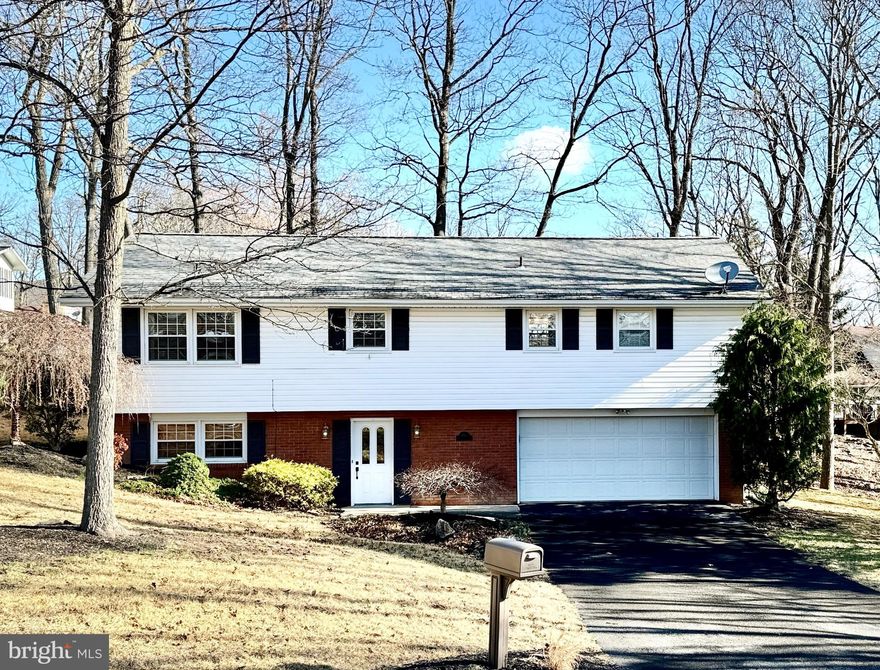 Venture to the beautiful subdivision of BEL AIR and arrive to this MOVE-IN READY, (3)-BEDROOM, (2)-FULL BATH, RAISED RANCHER, at the end of the Culdesac on WOODS EDGE COURT!  The spacious (2)-CAR GARAGE,  boasts built-in shelving, room for a workspace, and convenient interior access.  At the front entry the bright FOYER is ready for a lovely bench or ottoman.  The LAUNDRY ROOM is accessed through the Foyer- perfect for dropping off the sweaty sports clothes!  Tucked just past the laundry room is the oversized-FAMILY ROOM.  Ready for entertaining!  LET'S GO UPSTAIRS & SEE THE FRESHLY PAINTED MAIN LIVING LEVEL, with the REFINISHED HARDWOOD FLOORS IN ALL (3) BEDROOMS!  The KITCHEN offers a  BREAKFAST BAR with  spacious TABLE SPACE or make a cozy sitting are to enjoy the outdoor view through the PATIO DOORS to the REAR DECK.  The HARWOOD FLOORS in the Living and Dining Room areas are icing on the cake!  The Primary Bedroom with Full Bath brings the privacy you are looking for!  Enjoy the comforts of CENTRAL AIR & HEAT PUMP in this WELL-MAINTAINED brick and vinyl Raised Rancher!  Conveniently located in the beautiful MOUNTAINS OF WESTERN MARYLAND, near I68 , Northrop Grumman, IBM, shopping, schools and restaurants!  Schedule your appointment to tour today!