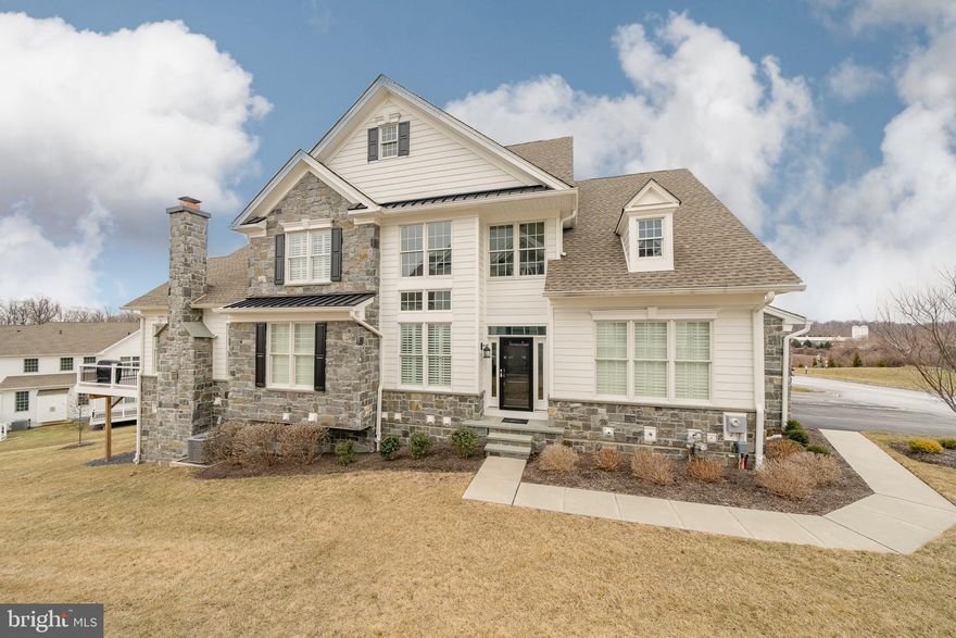 Nestled in sought after Liseter Community, this home offers a serene setting with easy access to shopping, dining, and major routes, ensuring both peace and convenience.
 3841 Meadow View Farm Road is where luxury and convenience meet in perfect harmony. This stunning property offers an unparalleled lifestyle, with world-class amenities and a thoughtfully designed home that provides both comfort and sophistication.  
Step into the grand sunlit foyer with soaring ceilings and gorgeous hardwood floors throughout the first floor. The expanded open-concept Great Room seamlessly connects the living, dining, and kitchen areas, creating a bright, airy space ideal for entertaining and everyday living. The Gourmet kitchen is a chef’s dream, featuring custom cabinetry, upgraded Quartz countertops, upgraded backsplash, and top-of-the-line appliances with a gas cooktop, built-in microwave and wall oven.  The dining area is designed for both style and functionality which features a stunning floor-to-ceiling wall of custom cabinetry, providing extra storage while enhancing the space with a refined, built-in aesthetic. The spacious First-Floor Primary Suite awaits you with expansive windows, a spacious walk-in closet, and a spa-inspired en-suite bath, offering both elegance and ease.  A dedicated first-floor office is a quiet space, perfect for remote work, study and/or formal dining. Convenient first-floor laundry with drop zone and cabinets – designed for effortless living adding ease and practicality to your daily routine.  Finish out the first level of this home with a half bath, coat closet, large two car garage and upgraded/expanded back deck. The second floor boasts a spacious loft area, perfect for a secondary living space, reading, or home office, along with two large bedrooms and a full bathroom, providing a comfortable and private retreat for family or guests.  The finished walk-out lower level is a versatile extension of your home with over 900 square feet of additional living space, ideal for a home theater, game room, or home gym with a second half bath and direct access to the backyard.  There are custom plantation shutters throughout the home making it truly move in ready. With meticulous upkeep and thoughtful details throughout, you can focus on relaxing, staying active, and embracing the lifestyle you deserve.  This is more than a home—it’s a refined leisurely way of life which includes exterior lawn maintenance, snow removal, trash & recycling in addition to that Liseter has to offer.  The blending of luxury, comfort, and practicality, offering an exceptional living experience in one of the area’s most sought-after communities.  Liseter’s premium amenities include the beautifully restored barn used for community social events, clubs and banquets. A state-of-the-art fitness center, a sparkling infinity pool, tennis courts, pickleball court, basketball court, bocce ball and beautifully designed clubhouse.  This home is just steps from the walking trails and Newtown Preserve which is about 100 acres of preserved nature with trails. Don’t miss the chance to make this your forever home. Schedule a private tour today to experience all that this property has to offer!