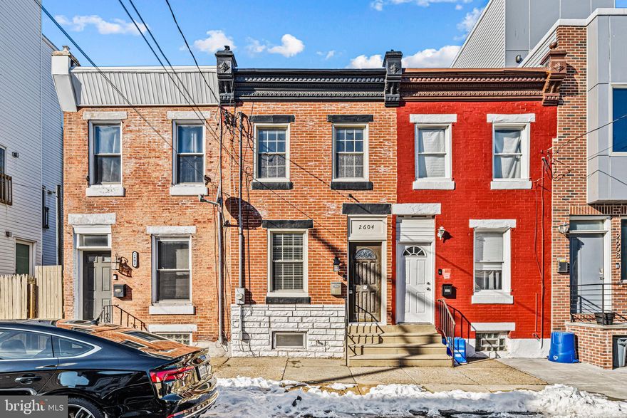 Welcome to this inviting 2-bedroom, 1.5-bathroom home in the vibrant city of Philadelphia, PA. As you step inside, you'll be greeted by an abundance of natural light and elegant hardwood floors throughout the first floor. The kitchen is equipped with stainless steel appliances and a breakfast bar with seating, creating a welcoming space for gatherings. The main level also offers a comfortable living area with air conditioning. Ascend the modern staircase with sleek railing to the second floor, where two bedrooms provide ample storage and a full bathroom. The finished basement offers additional living or entertainment space and a convenient half bath, while the outdoor area is ideal for relaxation and hosting gatherings. This home is conveniently located near Cione Playground and Stock's Bakery, providing easy access to local amenities and entertainment options. This property offers both comfort and practicality for modern urban living. Don't miss the chance to call this stylish and well-appointed residence your own.