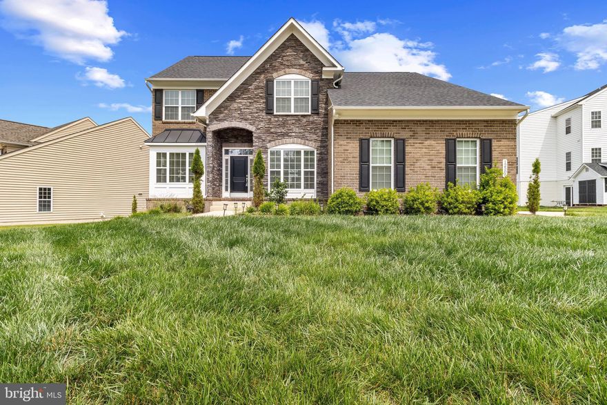 MAJOR PRICE REDUCTION - THIS CHARMING HOME JUST BECAME EVEN MORE AFFORDABLE!!  Welcome to your immaculate, nearly new luxury home, tucked away on a quiet private street with a cul-de-sac!  This stunning 4496 square feet, 4-year-old property is truly move-in ready and thoughtfully designed for modern living.It features 4 bedrooms and 2.5 bathrooms, with a full bath rough-in already in place on the lower level for future expansion.

You'll fall in love with the open-concept main level, which seamlessly flows into a spacious, light-filled family room complete with a cozy gas fireplace. The main floor also offers a formal dining room, a bright sunroom, a dedicated den/home office, and a convenient powder room.

The heart of the home is the gourmet kitchen, which boasts an oversized island with cabinetry on both sides, gleaming hardwood floors, a double oven, gas cooktop, stainless steel appliances, and abundant storage space—perfect for entertaining and everyday living.

Upstairs, the luxurious primary suite features two walk-in closets and a ceiling fan for added comfort. The spa-like ensuite bathroom includes a soaking tub, a modern walk-in shower with a drying bench, and elegant finishes throughout. For added convenience, a stainless steel washer and dryer are also located on the upper level.

The finished lower level offers a carpeted recreation room—ideal for relaxing or entertaining—as well as an unfinished room currently being used as a home gym.

Additional highlights include a spacious 2-car garage and a large driveway that accommodates up to six vehicles.

This beautiful home is ideally located with easy access to Route 5, Route 301, I-495, National Harbor, Joint Base Andrews, and Washington, D.C.

Don’t miss your chance to own this exceptional property in a prime location!