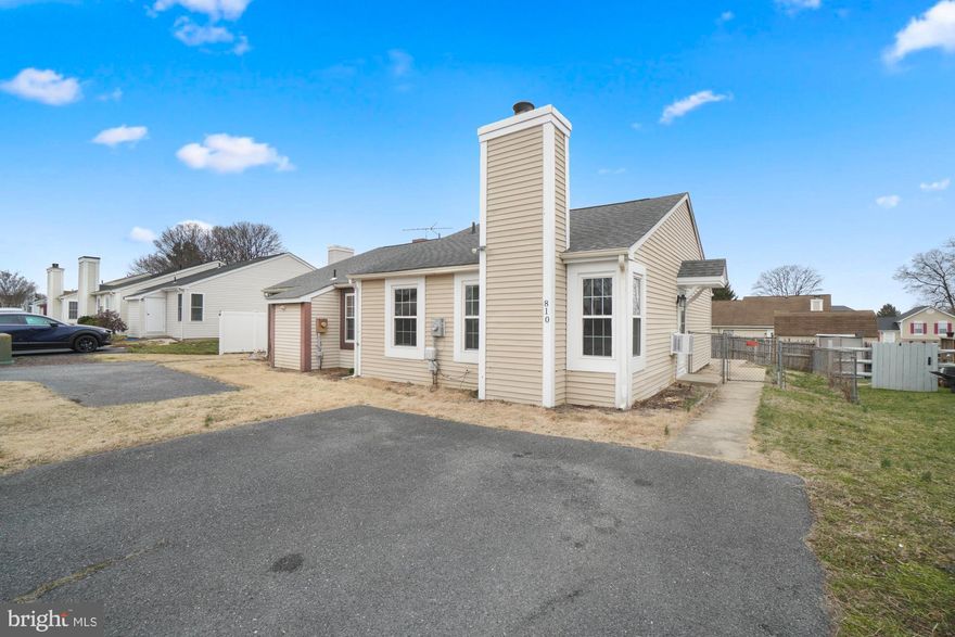 Buyer's financing fell through!  This is your chance to own this lovely end-unit townhome/patio home!  It has lots of natural light and all on one level in desirable Fredericktowne Village.  Freshly painted with two large bedrooms and 1 bathroom, a family room with a wood-burning fireplace and vaulted ceiling  and a kitchen with the same ceiling makes the townhome seem even more spacious.  The eat-in kitchen has been tastefully updated and offers a breakfast bar and laundry area .   Sliding doors lead to a patio behind the kitchen where you can relax and enjoy meals on warmer days.  There's plenty of space in the rear yard and it's fully fenced.  The townhome is conveniently located near shopping, major highways, dining, parks, pools, etc.  No HOA or condo fees!  Seller wants to sell AS-IS.  Hurry, this one won't last!