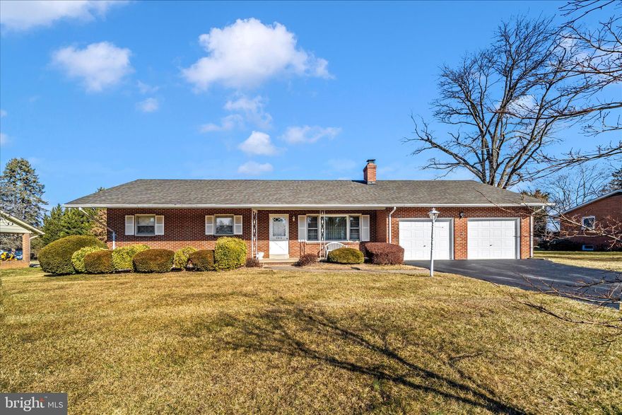 CLOVER HILL:  All-brick rancher features 3 bedrooms, 2 full baths,  dining room, eat-in kitchen,  hardwood floors,  an oversized garage,  brick fireplace in the living room,  a covered porch in the back overlooking a beautiful approximate 1/2 acre lot.  Also an unfinished basement ready for your own touches.  All this and NO city taxes.  And the home is close to Frederick Community College, medical centers, restaurants and shopping.This wonderful community is well known for its pool, park,  and ballfields.