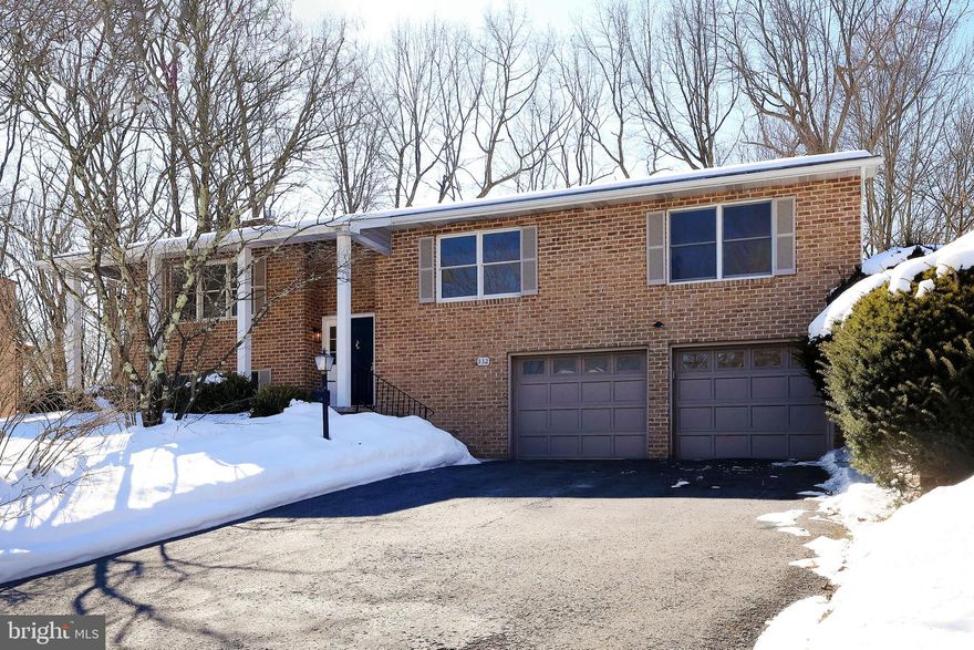 OPEN HOUSE - Thursday, Feb. 19th, 4:30 - 6:00 PM.  Welcome to 532 Longbarn Road! Loaded with updates and full of character, this 4‑bed, 3‑bath home in desirable Park Forest blends charm with modern updates. With 2,328 finished square feet, this home boasts a newer roof (2024), new hardwood and LVP flooring, updated bathrooms and a fresh coat of paint throughout. The covered front porch features newly poured concrete steps, giving the exterior refreshed curb appeal. The upper level offers an open living/dining combo, an inviting eat‑in kitchen, and sliders leading to the deck. Large windows brighten the space with natural light, adding warmth and charm. Down the hall are three bedrooms, including a spacious primary suite with an ensuite bath, a full hall bath and numerous closets for storage. The lower level provides an expansive family room with new LVP flooring and a propane fireplace (condition unknown), creating a cozy space to unwind or entertain. A sizable fourth bedroom with two closets connects off the family room, along with another full bath. The laundry room features a utility sink and plentiful cabinetry for additional storage and organization. The 2‑car integral garage opens directly into the lower‑level foyer for everyday convenience. Outside, enjoy a private backyard that backs to trees — perfect for relaxing, gardening, or play. All of this in a prime location, close to schools, parks, shopping, and PSU campus. Schedule your showing today!