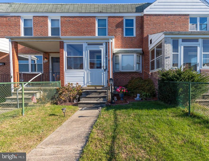 Welcome to the charming Beverly Hills community! A sun filled, enclosed front porch greets you as you approach the home.  This lovingly maintained, cozy townhouse boasts 3 bedrooms and 2 full bathrooms, featuring a spacious living room flooded with light through the bay window, a separate dining room perfect for entertaining, and a great kitchen with updated countertops for the chef of the household.  Three bedrooms as well as a full bath with skylight are located on the upper level.  The lower level offers a versatile space with a recreation area, second full bath, laundry room, and ample storage. Step outside to the covered rear deck to relax and enjoy weekend grilling. With a superior location, nestled near shopping, dining, and entertainment, this residence is just minutes away from White Marsh, Canton, Fells Point, and downtown. Updates include washer (2023), water heater (2023), roof coating (2020), electric service cable (2021), and bathroom skylight (2020).  Don't miss the opportunity to experience comfortable townhouse living in this prime location!