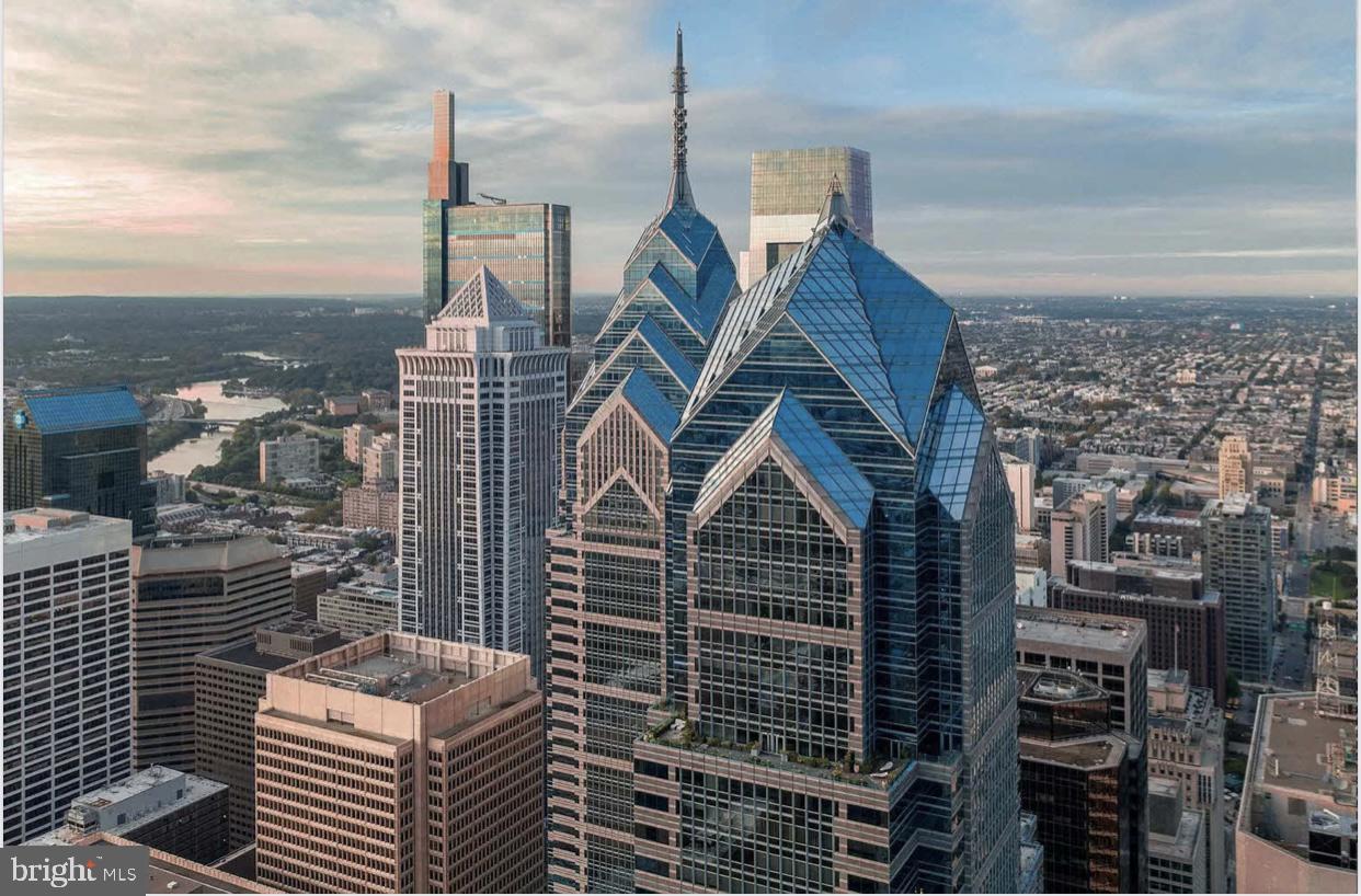 Another big price reduction ! Discover unparalleled luxury in the heart of Center City at The Residences of Two Liberty Place. This exquisite former model home, freshly painted and with new carpet, boasting hardwood flooring throughout the open-concept living, dining, kitchen, hallways, and den areas, top-tier amenities and concierge services that begin the moment you arrive. Master bedroom w lag custom built-out closet and marble master bath. 2nd bedrm has walk-in closet and marble bath. Gourmet kitchen features Snaidero cabinets, granite countertops, Miele appliances, Sub-zero fridge, wine cooler and built-in espresso machine. Spectacular Square and Delaware River Views! Enjoy State of the art 24.7 gym, endless exercise pool, yoga studio, steam showers, saunas, media room for entertaining, business center and stellar concierge door to door services. Fantastic location near shopping and food venues and the excellent R2L Daniel Stern restaurant offers the perfect blend of convenience and luxury.