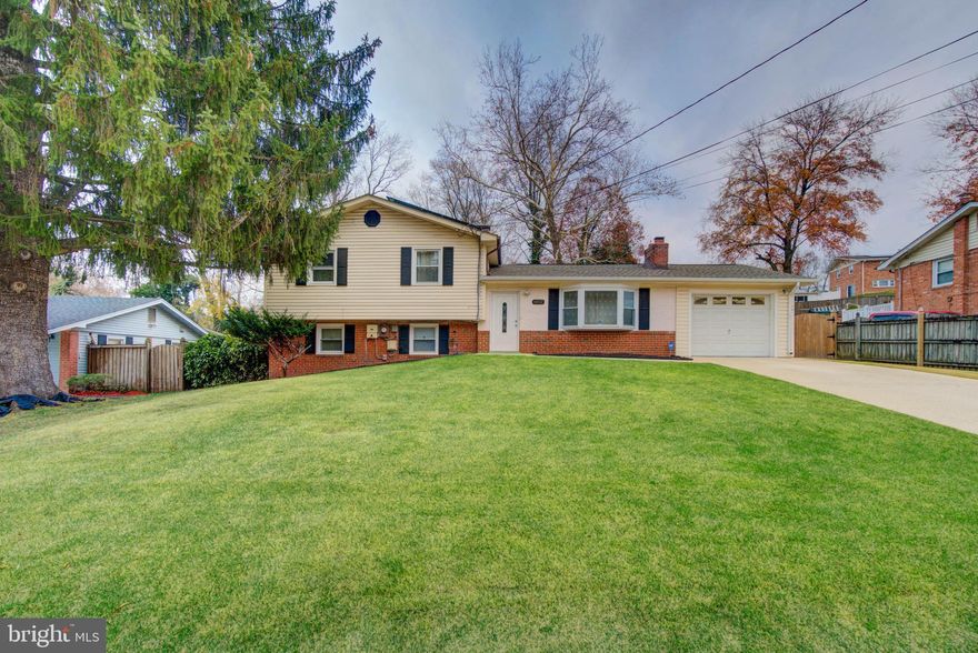 *Won't be ready to show until end of December!* 
Discover remarkable interior design, abundant natural light, and rich dark hardwood floors that create a warm and inviting atmosphere. The spacious open-concept gourmet kitchen includes under-cabinet lighting, granite countertops, top-of-the-line stainless steel appliances, and seamless flow into the main living areas—ideal for cooking, gathering, and entertaining.
Enjoy cozy evenings by the wood-burning fireplace, or unwind in the lower-level family room with an exterior walkout leading to a fully fenced backyard perfect for outdoor living.
Thoughtful updates continue throughout, featuring beautifully renovated bathrooms and modern touches that enhance the home’s character.
Home Highlights
•