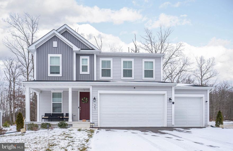 Welcome Home to 345 Bay Cub. This almost new home is amazing. The main level provides a vast, open-concept with ample space perfect for both relaxation and entertaining. The chef-inspired kitchen boasts a generous center island with sleek granite countertops and top-of-the-line appliances, seamlessly flowing into the family room, creating an ideal space for gatherings or cozying up next to the fireplace. Step outside onto the patio, where you can enjoy the serene outdoor landscape which backs to woods for additional privacy. Upstairs, convenience meets style with a spacious, multi-purpose loft that adds versatility to the floor plan, while a beautifully appointed full bath with elegant quartz countertops serves the two generously sized bedrooms and a thoughtfully designed laundry area with washer and dryer for easy living. The owner's suite is a true retreat, offering a huge walk-in closet and an amazing private bath for a luxurious spa-like experience. Located near the pristine headwaters of the Chesapeake Bay, this vibrant community offers unparalleled access to outdoor recreation, including walking trails, expansive open spaces, golf courses, and the nearby Elk Neck State Forest or enjoy a night out on the town with restaurants, entertainment and shopping all a couple of minutes away. With easy commutes to I-95, APG, Wilmington, Philadelphia, and Baltimore, this location is perfectly located for both work and play.