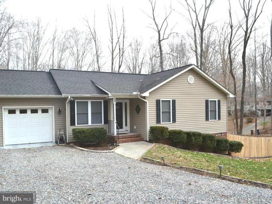 PRIVACY, AMENITIES, AND STORAGE! THIS ADORABLE, WELL KEPT HOME HAS ALL YOU COULD HOPE FOR! HUGE .7 ACRE CORNER LOT, FULLY FENCED, WOODED BACK YARD, & GREAT DECK FOR GRILLING & ENTERTAINING!  2 DOG DOORS LEADING TO GARAGE AND OUTSIDE. MASTER BEDROOM W/ HIS & HER CLOSETS, VAULTED CEILINGS, CERAMIC TILE IN KITCHEN. STORAGE GALORE-PULL DOWN ATTIC & EXTRA LARGE, INSULATED CRAWL SPACE. BEAUTIFUL!