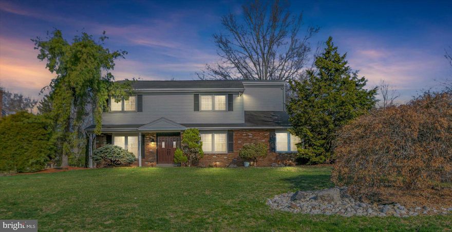 Welcome to this stunning center hall colonial nestled in a picturesque neighborhood on a nearly half-acre lot. Boasting 3,800 sq. ft. of living space, this home features a versatile in-law suite, a dedicated home office, and an expansive primary suite.

As you step through the covered double-door entrance, you’re welcomed into a bright foyer with a convenient coat closet and powder room. To the left, a spacious living room offers endless possibilities, while the large dining room comfortably accommodates an oversized table for gatherings. The eat-in kitchen provides ample cabinet and counter space, overlooking the beautiful backyard. Adjacent to the kitchen, the cozy family room with a wood-burning fireplace is perfect for relaxing, with a custom nook ideal for a projector setup.

A side entrance leads to the oversized mudroom and the private in-law suite, which features bamboo flooring, a walk-in closet, and a recently updated handicapped-accessible bathroom with heated natural stone flooring.

Upstairs, the grand primary suite is a true retreat, offering room for a king-size bed, a sitting area or office space, and his/hers custom walk-in closets. The ensuite bathroom boasts an oversized ceramic tile shower with a rainfall showerhead, dual sinks with granite countertops, and a private toilet room. Three additional generously sized bedrooms with ample closet space, a spacious laundry room with a utility sink, and a hall bath with a Swanstone tub complete the upper level. The front-facing bedroom is exceptionally quiet, making it an ideal home office.

The full unfinished basement provides exceptional storage and potential for additional living space. A huge attic, multiple large closets, and a backyard shed ensure all your storage needs are met.

Step outside to enjoy a beautifully landscaped, flat backyard featuring a brick patio and a professionally installed play system, perfect for outdoor fun and entertaining. Mature foliage offers privacy along the back and side of the property. A covered side patio is an ideal spot for storing sports gear or enjoying shaded relaxation.

The current owners have taken care of several items recently and are under contract to put on a NEW ROOF in 2-3 weeks. This home is conveniently located with easy access to Route 309 and just minutes from the Colmar train station, walking trails, parks, and recreational facilities. With a motivated seller ready for a quick close, don’t miss your opportunity—schedule your showing today!