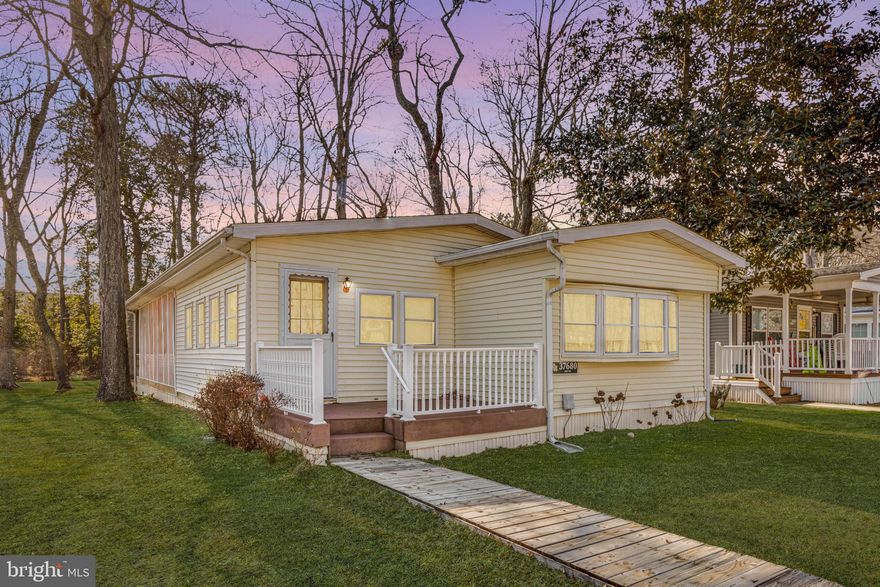Back on the market at no fault of the seller. 
Charming 2-bedroom, 1-bathroom home in the Shady Park community, just minutes from Fenwick Island. This well-maintained home offers a comfortable living room, a cozy den for extra gathering space, and a kitchen with a dining area. Enjoy coastal living with a screened porch and an outdoor shower—perfect for rinsing off after a day at the beach. Additional storage for all your beach needs is available in the backyard shed. Whether you're looking for a summer getaway or a year-round residence, this home provides a fantastic location and a relaxed lifestyle near shopping, dining, and the shore. Don’t miss the opportunity to schedule a private tour!