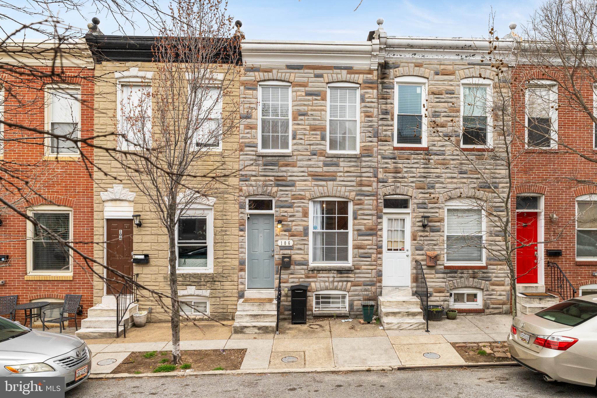 Presenting 106 N Curley St, desirable Baltimore City row home situated just a short walk from the pet-friendly Patterson Park. As you step inside, you'll notice a blend of modern updates and classic charm, featuring crown molding, hardwood floors, and an exceptional kitchen offering granite countertops, stainless steel appliances, and an updated design. Two spacious bedrooms, each with ensuite bathrooms can be found on the upper level, offering both comfort and privacy. Partially finished basement that can serve as a home office or gym, with additional storage space. Rounding out the home is a main level laundry room (washer & dryer, 2 years old) , which steps out to your brand new rear deck and private patio... the perfect spot to enjoy beautiful Baltimore evenings. Welcome home to Patterson Park.