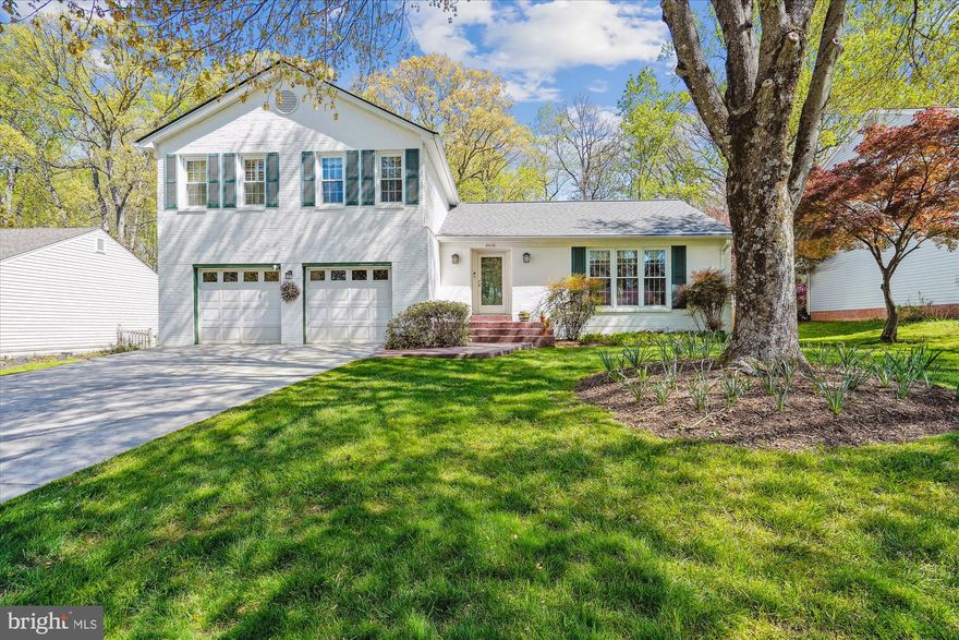 Welcome Home to this beautiful colonial split-level located in Vienna Manor neighborhood of Vienna! Owners have lovingly maintained and upgraded this surprisingly spacious home over the years. Extension was done in 2006 to the kitchen ,perfect place for entertainment.The kitchen has been updated with refinished cabinetry, granite countertops, and a high end stainless steel appliances.This  home has so many wonderful updates that provide comfort, convenience, and visual charm. It features four bedrooms with pleasant views and renovated kitchen  and bathrooms.  Step inside the foyer with experience the warmth of hardwood floors in the living room and the dining room.The upper level boasts 4 bedrooms and an updated  full bathroom with heated floor, walking closet . The lower level includes large family room with a ceiling-to-floor brick fireplace for cozy evenings to watch movies,Heated tiles, including French-style double doors lead to a beautiful  patio , perfect for barbecues, enjoying a cup of coffee or reading a book. The laundry room features a custom-designed, built-in closet for optimal organization. There is an additional AC unit was add it to the top level to enjoy the coolness in summer.The furnace are in excellent condition and professionally maintained twice a year.The roof was install 2024.The garage accommodates two SUVs and provides additional storage space. The large flat,  backyard is perfect for outdoor games or gardening. Enjoy year-round color and fragrance from daffodils, dahlias, peonies, roses, and azaleas, all meticulously maintained within the professionally landscaped lawn.  This home offers a peaceful retreat set back from the street while just minutes away from everything you need.  It is very convenient 1mile from Dunn Loring Metro and Tyson's Corner, the Metro's Silver Line, the Beltway. And minutes away from (W&OD) trail and all of Vienna's wonderful shops and restaurants.