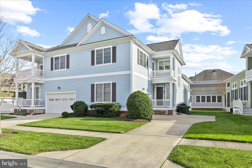 Discover this beautifully updated 3-bedroom, 3-bath home offering 2,317 sq. ft. of thoughtfully designed living space in a vibrant bayfront community. The main level features engineered hardwood flooring, elegant crown and drop moldings, and a cozy gas fireplace in the living room. The kitchen shines with Corian countertops, a custom backsplash, and recessed lighting. The spacious floor plan includes two en-suite bedrooms—one on the main level with a walk-in shower, soaking tub, and double vanity, and another upstairs with an updated walk in tile shower. A structural addition creates a second living room upstairs, perfect for relaxation or entertaining. Enjoy outdoor living on the screened porch and extended deck, plus a 2-car garage for convenience. Conditioned Crawlspace. Roof replaced in 2025. Community amenities include indoor and outdoor pools, bay access, a bayfront restaurant, golf club with year-round dining, shopping, grocery, walking trails, and sidewalks—all designed for a resort-style lifestyle. Be sure to view 3D Tour.