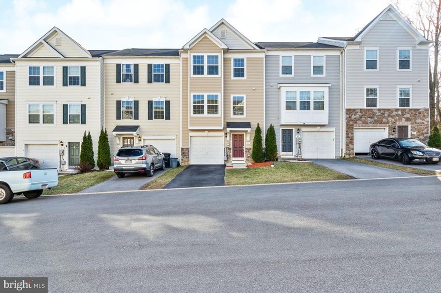 Welcome to 65 Antigua Drive. Minutes to the heart of Hedgesville, WV and a short drive to I-81. Located in the established neighborhood of Stonebrook Village. This 3 bedroom and 2.5 bath interior home is ready for you.  Walkout level basement to a fully fenced-in yard, the rec space is perfect for that home office, guest bedroom, or home gym. The upper levels feature a well appointed eat-in kitchen with S/S appliances & island, a huge family room with accessibilty to a half bath, and spacious bedrooms.  This the perfect place to call your Home Sweet Home. Schedule your private showing today!